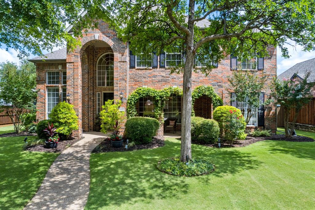 Gated and guarded luxury awaits in Starwood's exclusive Quail Run subdivision! This stunning 5-bed, 4.5-bath home showcases an open and airy sunlit floorplan with primary and extra bedroom down, hardwood floors, a formal dining room, a formal living room, and a dedicated office. The kitchen boasts abundant cabinetry, stainless steel appliances,  a massive island, built in desk and cookbook nook, plus an eat-in area. Head to the primary suite and a cozy up to the fireplace or enjoy a spa-like bathroom with a jetted tub, dual vanities, and a walk-in shower. Entertain in style in the backyard oasis with a covered patio, outdoor kitchen, and resort-style pool and spa. A charming front porch with ivy-covered arches adds to the beautiful curb appeal of this home. Tons of upgrades in the last 5 years like new hot water heater, new AC unit, new pool pump, and more. Starwood is an active community with top-tier amenities, like a resort-style pool, tennis courts, gym, playground, and walking trails. Unbeatable Frisco location minutes from The Star District with easy Dallas North Tollway access!