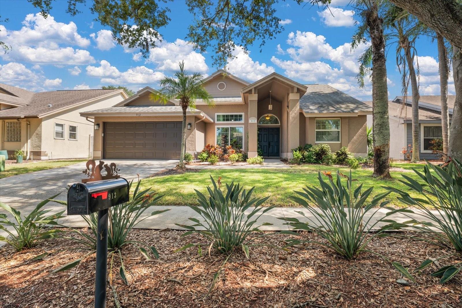 Welcome to your private Florida oasis in the desirable Westwinds community of Tarpon Springs! This beautifully updated and meticulously maintained 4 bedroom, 2 bath, 2 car garage pool home offers 2,001 sq. ft. of thoughtfully designed living space, a desirable split bedroom floor plan, and an incredible backyard setting overlooking a peaceful conservation area. From the moment you arrive, the attractive curb appeal and new fountain water feature create a welcoming first impression. Step inside to a light and inviting interior featuring spacious living areas and a functional split floor plan offering privacy for family and guests. The secondary bedrooms include a convenient Jack and Jill bath arrangement. The backyard is where this home truly shines! Step through the impact glass sliders to your screened in pool and brick paver outdoor living area. With the home backing directly to a conservation area, you'll enjoy a tranquil natural backdrop and exceptional privacy with no rear neighbors. Solar panels help heat the gorgeous pool while also helping reduce energy costs. When it comes to peace of mind, there are a few great upgrades in past few years! All windows and sliders are hurricane impact glass, plus a new hurricane rated garage door, new A/C in 2024, new hot water heater in 2025, and freshly painted exterior. The location puts you close to everything that makes Tarpon Springs special, including the famous Sponge Docks, charming historic downtown, Sunset Beach, Fred Howard Park, the Tarpon Springs bayous, shopping, dining, golf and more.