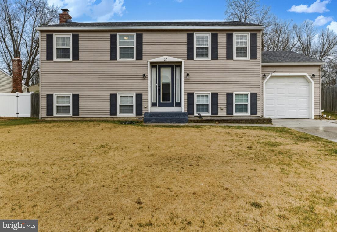 OPEN HOUSE  Saturday 1/17 (11am-1 pm)      Welcome to 27 Lincoln Drive, Glen Oaks, Gloucester Township—a beautifully updated split-level home that perfectly blends comfort, style, and practicality. As you enter through the tiled foyer, you’re immediately greeted by custom railings that add a touch of elegance to the space. The entire home boasts stunning bamboo-engineered hardwood floors, offering a sleek and modern feel throughout.The heart of the home is the spacious kitchen, designed with both function and style in mind. It features an oversized island with a gorgeous quartz countertop, wine fridge, and convenient storage on both sides of the island.  Perfect for meal prep or gathering with friends and family. The kitchen also has a farmhouse sink—ideal for the home chef. Soft-close cabinets offer quality craftsmanship, but it’s the custom pull-out pantry that really steals the show, providing tons of storage and easy access to all your kitchen essentials.Upstairs, you’ll find three generously sized bedrooms and a shared bathroom, all offering a serene and comfortable atmosphere. The huge master suite is a true retreat with vaulted ceilings, a spacious walk-in closet, and a private en-suite bathroom. The bathrooms have been beautifully updated with stylish tiled floors, new vanities, and sleek black matte faucets—perfectly balancing modern elegance and functionality.The finished lower level offers a warm and welcoming space for relaxation and entertainment. A wood-burning fireplace adds a cozy ambiance to the room, while the custom tray ceilings create a sophisticated touch. This level also features a fifth bedroom—ideal for guests, an office, or a playroom—and a large half-bath for added convenience. Plus, a spacious laundry/utility room leads to the attached 1 car garage, offering even more storage and functionality.Step outside into your massive back deck, perfect for hosting family gatherings or enjoying a peaceful morning coffee. The fully fenced-in yard provides privacy and space for kids or pets to play freely. If you need more storage, you’ll love the large crawl space under the house, providing ample room for seasonal items or other storage needs.This home is equipped with a Goodman HVAC system, ensuring your comfort year-round, and a new roof installed just five years ago for added peace of mind.Located in a prime spot, you’re just steps away from Veterans Park, the Gloucester Township community pool, and the Gloucester Township Police Department for convenience and security. Plus, you’ll be close to Valleybrook Golf Course and Filomena’s for leisure and dining. The home is within the Blackhorse Pike Regional School District, with easy access to Philadelphia (just 10 minutes away) and the Jersey Shore (only 45 minutes from your doorstep).Whether you’re looking for a place to entertain or raise a family, 27 Lincoln Drive is the perfect place to call home. It’s more than just a house—it’s a lifestyle! Please contact Renne with all questions and offers.