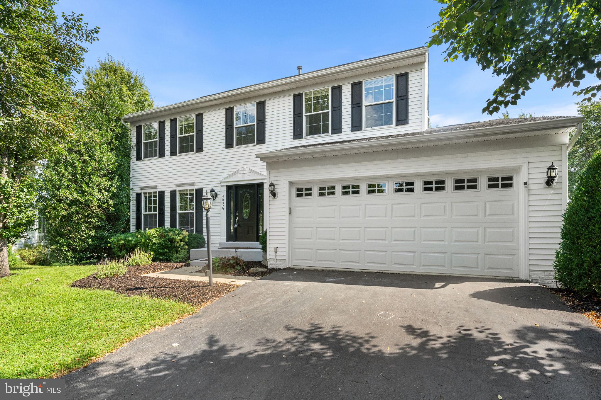 Welcome home to this recently updated 4-bedroom, 2.5-bath Colonial tucked away on a quiet cul-de-sac in the sought-after Ridges at Ashburn, perfectly situated near top-tier schools.  With approximately 2,435 square feet of finished living space above grade, plus a full basement and a two-car garage, this home offers a wonderful combination of space, privacy and everyday functionality.The bright, inviting main level features hardwood floors and a comfortable floor plan with separate living and dining rooms and a spacious family room with fireplace. At the heart of the home is the updated eat-in kitchen, featuring generous cabinetry, a center island, stainless steel appliances, cooktop and double wall ovens. The kitchen and family room flow naturally to the deck and private backyard backing to trees—an ideal setting for outdoor dining, entertaining or simply enjoying the peaceful surroundings.Upstairs, the spacious primary suite includes a walk-in closet and renovated en-suite bath with dual vanity, soaking tub and separate shower. Three additional bedrooms share an updated hall bath, providing plenty of room for family, guests or a home office.The walk out full basement is ready to be finished and offers excellent additional space and flexibility for a future recreation room, gym, office or storage. A two-car attached garage completes the home.Located in an established Ashburn community with access to a community pool, tennis and basketball courts, playgrounds and common areas, 20379 Snowpoint Place also offers convenient access to parks, trails, shopping, dining and major commuter routes. A warm, well-designed home in a private setting—ready for its next chapter.