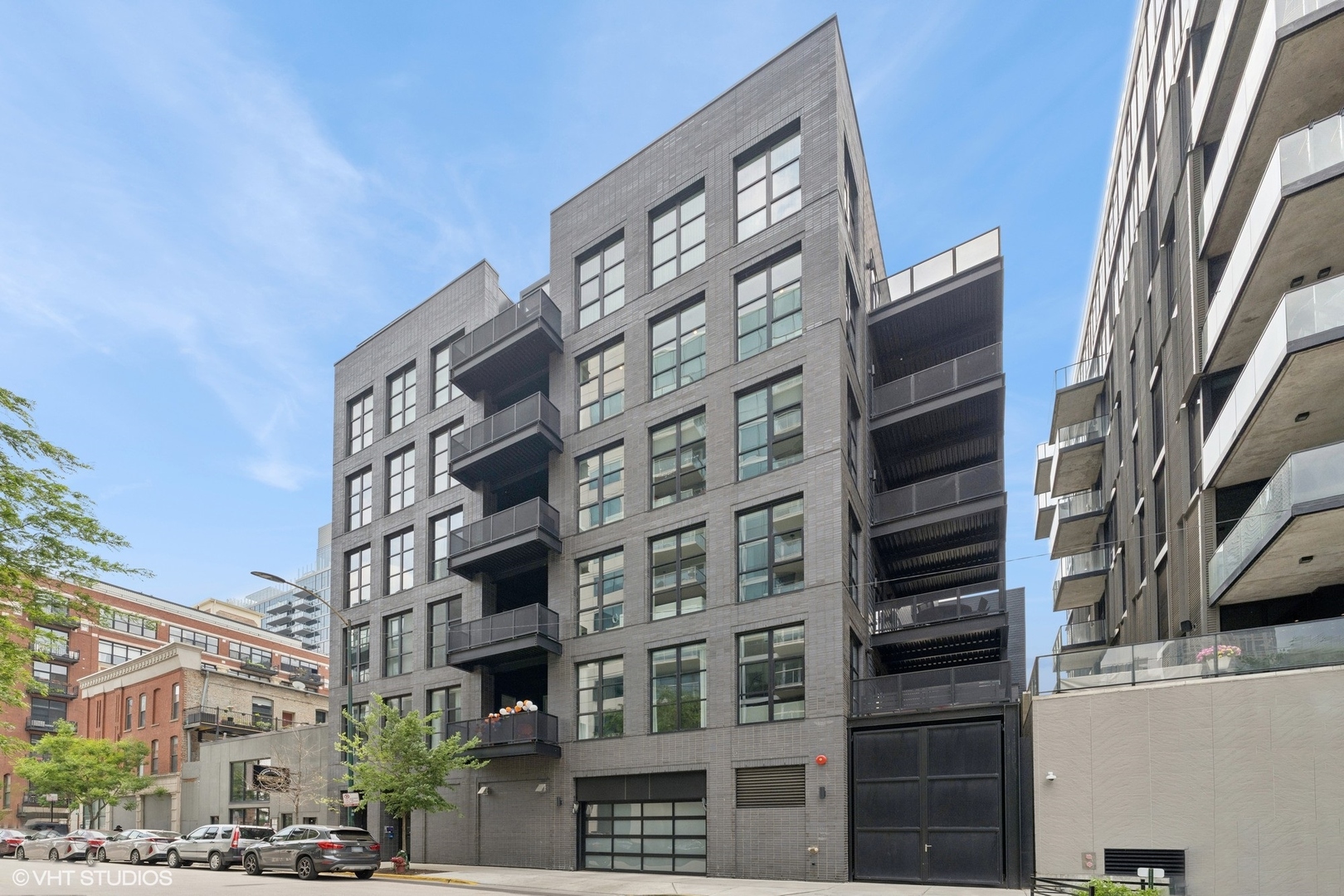 Located in the heart of the West Loop, Residence 5AB at 128 S. Green is a rare, full-floor 5-bedroom, 5.1-bathroom home offering over 4,700 square feet of luxurious single-level living with private elevator entry. The expansive open floor plan includes a chef's kitchen with Sub-Zero and Wolf appliances, a walk-in pantry, an oversized island, and panel-ready dual dishwashers-all overlooking a large dining area and sun-filled living and family rooms that flow to two additional terraces. The primary suite is a private retreat with two walk-in closets and a spa-like bath featuring heated floors, a freestanding tub, dual vanities, separate shower, and Toto Washlet-ready toilet. Each of the four additional bedrooms offers an ensuite bathroom and generous storage. A large library/den provides flexible space for an office, media room, or playroom. Designed with year-round entertainment in mind, this home features a stunning rooftop that comes fully equipped with high-end Smart Home features, including a mounted TV, integrated speakers, WiFi access point, infrared heaters, a gas fire pit, and custom lighting. Ceiling fans add comfort, while a sleek bar area with True refrigerator drawers makes hosting effortless. The motorized louvered roof can be adjusted with a simple touch, offering the flexibility to enjoy the outdoors in any season. Additional highlights include Control4 home automation, Lutron lighting and shades, dual surround sound zones, a walk-in laundry room with custom cabinetry, and premium HVAC with dual Reme Halo UV systems. The home also includes an AV/storage room, oversized cloak closet, two storage cages, and three climate-controlled garage parking spots. Situated in a boutique elevator building, just steps from parks, grocery stores, Randolph Street dining, Fulton Market, and more-this is West Loop living at its finest.