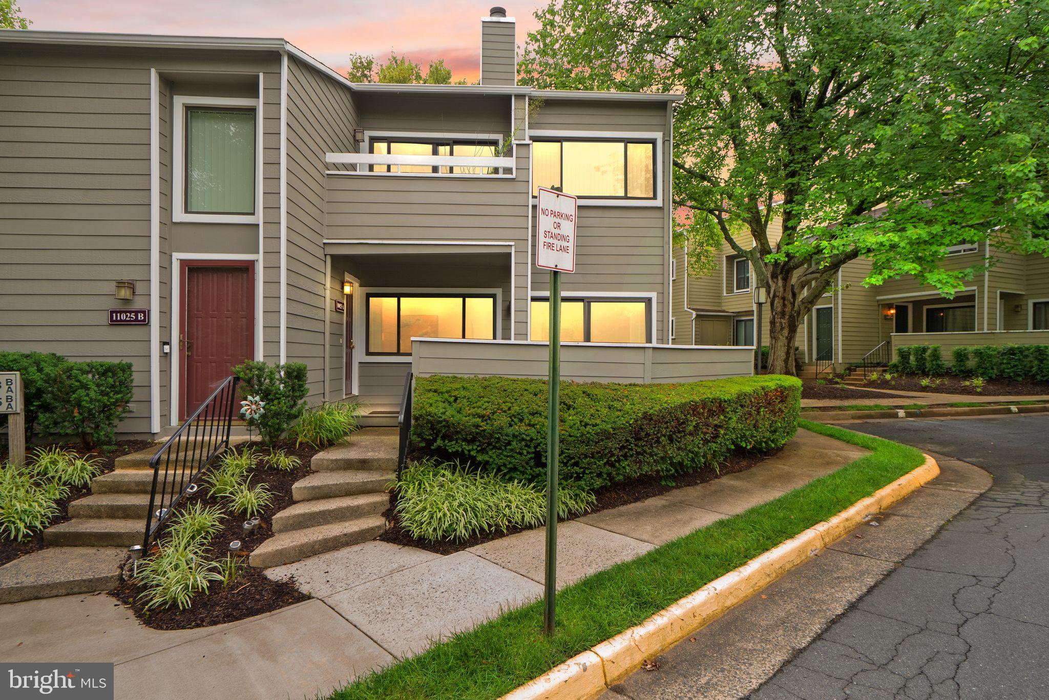 Perfect 2BR / 1BA main-level condo with low-entry steps for easy access.  Just minutes to the Wiehle Metro Station, South Lakes Village Center, Lake access, shopping, dining and South Reston walking trails!  Fresh LVP flooring flows throughout the bright, open interior. Enjoy the convenience of an in-unit washer and dryer, new recessed lighting, and a cozy wood-burning fireplace. Large windows fill the space with natural light, and the private deck provides an ideal spot for outdoor dining or relaxing. Comfortable, move-in ready living in a convenient Reston location.
