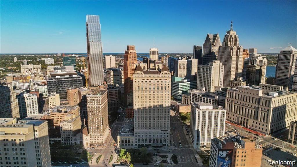 Opportunity awaits you. This "White Box" penthouse can be yours; all you need to do is add your personal finishing touches. Discover modern luxury in this exquisite 3-bedroom, 3-bathroom penthouse located in the heart of Detroit. This unit boasts breathtaking skyline views from its expansive windows, allowing natural light to flood the open-concept living space. Retreat to the spacious primary suite, complete with a walk-in closet and a private en-suite bathroom. The second and third bedrooms are equally inviting and can serve as  guest rooms or home office space. Enjoy the convenience of in-unit laundry and assigned parking. Residents have access to top-notch amenities, including a fitness center, concierge, on-site restaurants, Starbucks, rooftop terrace, and community lounge, all within a secure building. Seller and Buyer can work in conjunction to obtain use of the three deeded outdoor rooftop spaces with stellar, one of kind views of the City of Detroit, Detroit River and Canada. The finished photos are staged for your imagination of what you could do with this space.  Located just steps away from vibrant dining, shopping, and cultural attractions, this penthouse offers the ultimate urban lifestyle. Don’t miss your chance to make this stunning unit your new home!