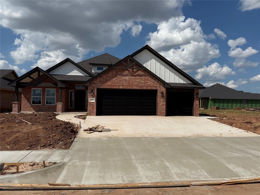 Introducing this stunning home that perfectly blends modern elegance with functional design! This open floor plan features a soaring vaulted ceiling in the living room, along with expansive windows that flood the living space and kitchen space with natural light, all while offering views of the covered back patio. The gourmet kitchen features state of the art appliances, and a large center island, making it a chef's dream. The luxurious primary suite showcases a freestanding tub, walk-in shower with two shower heads, and TWO spacious walk-in closets. This home offers en-suite baths for each secondary bedroom and an office which can be used as a 4th bedroom. Additional amenities in this home include, a powder bath, designer fireplace, mud bench/drop zone, designer lighting, can lights, gorgeous designer tiles, granite countertops and much more! **For a limited time only, we are offering a $9,000 Builder's Special and $17,835 Early Bird Special. Go under contract this month on 2225 SW 160th Street and receive the Early Bird Special: FREE upgraded tile & flooring ($17,835 value) plus the $9,000 Builder's Special for upgrades of your choice. Total value of $26,835.