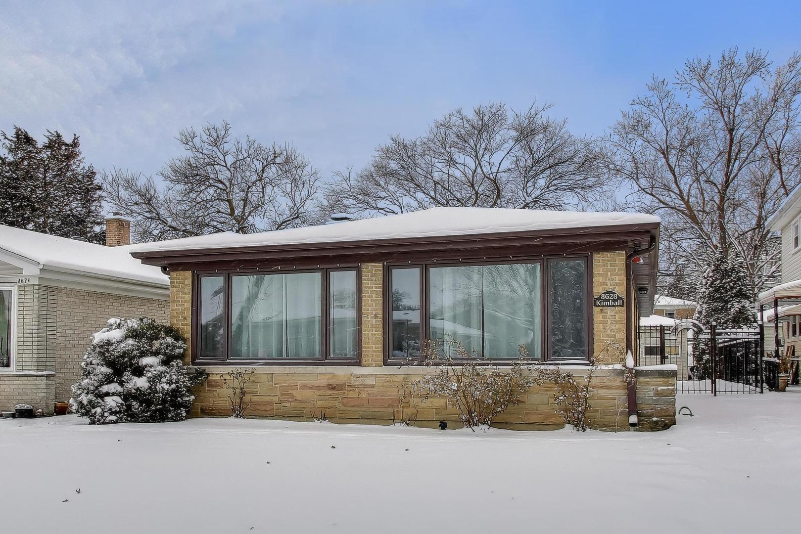 Welcome to this beautifully reimagined brick ranch in the heart of Skokie- where timeless construction meets high-end modern design. This thoughtfully renovated home offers exceptional craftsmanship, premium materials, and a highly functional layout perfect for today's lifestyle.    The main level features a bright, open-concept living and dining area with rich hardwood floors, recessed lighting, and large picture windows that flood the home with natural light. The designer kitchen is the true centerpiece, showcasing custom Amish-made cabinetry, quartz countertops, a statement center island, high-end stainless steel appliances, designer lighting, and a beautiful tile backsplash-combining elegance, durability, and artisan craftsmanship rarely found at this price point.    Three well-proportioned bedrooms on the main level offer flexibility for family living, guest space, or home office use, complemented by a fully updated modern bathroom with quality finishes and clean design.    The fully finished lower level dramatically expands the living space and features a massive recreation room ideal for entertaining, media, gym, or playroom use, along with a second full bathroom, dedicated laundry area, and two additional rooms. This level offers exceptional flexibility for office space, guest suites, fitness rooms, or creative use.    Outside, enjoy a generous yard- perfect for outdoor entertaining, plus a detached garage and extended driveway providing ample parking and storage. This home also feeds into Walker Elementary and Evanston Township High School- two award winning schools.