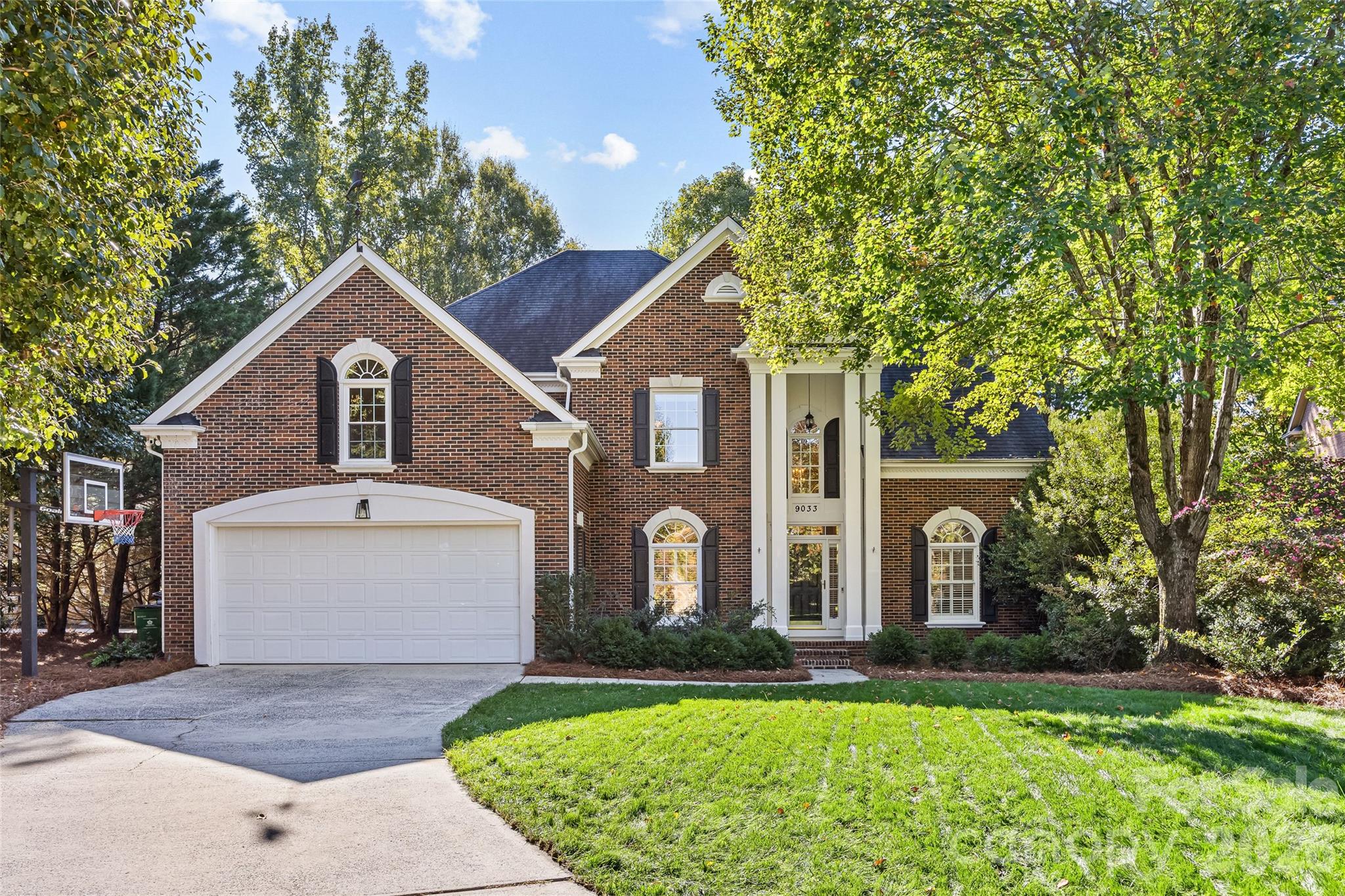 Privately situated on a cul-de-sac in sought-after Providence Heights, this beautiful five-bedroom home blends thoughtful updates with inviting spaces. The peaceful setting offers a welcome sense of retreat, while refreshed interiors make you feel at home from the moment you enter. A welcoming foyer opens to gracious living and dining room creating a first impression of lovely spaces for gathering and entertaining. Updates continue throughout the home including the kitchen renovated in 2021, fresh paint and new carpet throughout, and newly renovated downstairs bathroom add to the home’s appeal. A custom primary closet brings organization to your daily routine, while the family room’s gas fireplace creates a cozy gathering place. A spacious bonus room above the garage offers flexibility for a playroom, home office, or additional lounge space. Outdoors, the rebuilt and refinished deck provides an inviting spot to unwind or entertain while enjoying the tucked-away surroundings and beautifully landscaped yard.  Conveniently located to Arboretum shopping/dining, I-485 and many other areas.
