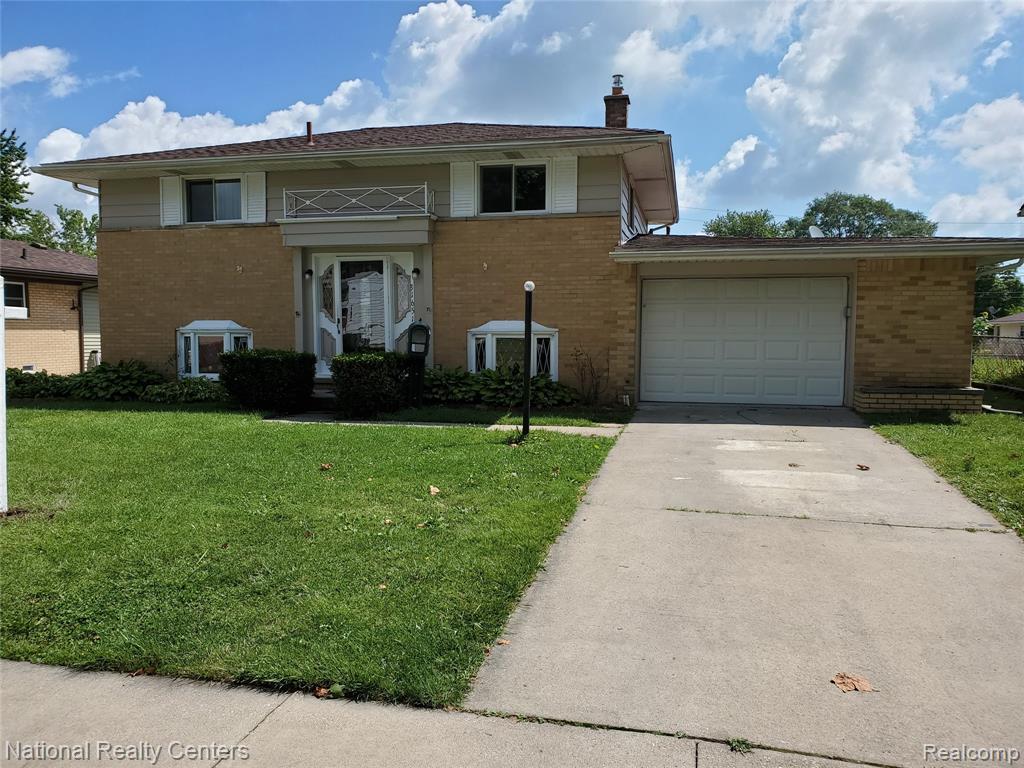 Enjoy this home with many rooms with new carpeting. Updated bath in master bath. Updated and attractive front entrance door.  Attached garage that is drywalled and has a furnace. Large rear deck off rear of home. Updates are roof about 11 years old and furnace about 10 years old.