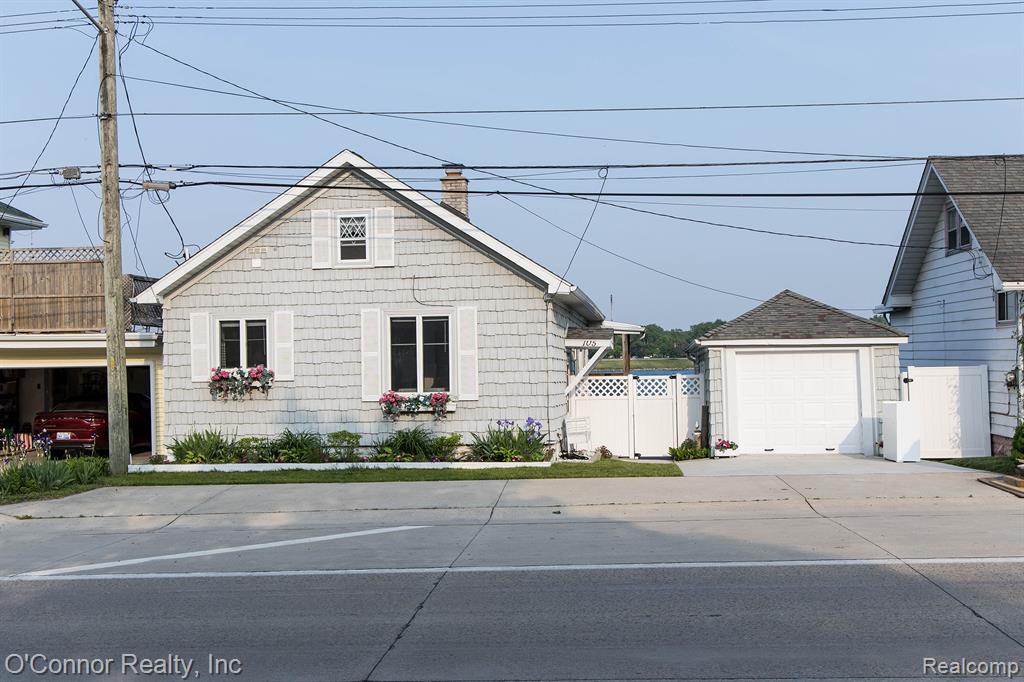 Your Affordable Riverfront Dream Starts Here! Here’s your chance to own a slice of paradise on the beautiful St. Clair River—at an affordable price! Imagine relaxing on your covered porch any time of day, taking in stunning river views and watching boats pass by… it truly doesn’t get better than this. This charming bungalow has been thoughtfully updated, so you can move right in and enjoy. Major improvements include a brand-new steel seawall, new roof, new furnace, updated electrical, new concrete driveway, and a new garage floor—just to name a few. The main floor features a spacious living room with breathtaking river views, a primary bedroom overlooking the water, and a completely remodeled bathroom with a walk-in shower. The kitchen offers ample cabinet space, all appliances included, and a cozy dining area. Upstairs, you’ll find a large bedroom with extra closet space plus an additional room—perfect for storage, a home office, or flex space. The fully finished walkout basement is ideal for entertaining, complete with a family room, bedroom, full bath, and a second kitchen—making it perfect for guests or gatherings after a day on the river. Outside, enjoy 70 feet of brand-new steel seawall—perfect for fishing, relaxing, or docking your boat. A 1-car detached garage with a new concrete floor adds extra convenience. The sellers have done TONS of work—now it’s your turn to enjoy it. Immediate possession available—schedule your showing today!