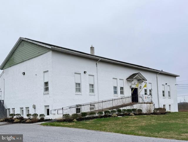 This property offers a unique investment opportunity with multiple income streams. The seller has obtained township approval to construct a 5,000 SF warehouse-style building, bringing the total to three potential income-producing structures. Currently, there is a 7,152 SF Building that was a school housethen the district court.  Full-size basement as well.  The second building is 3,520 and consists of 4 -Garages, with powder rooms and heaters. Since acquiring the property, the owner has made significant upgrades, including the installation of new heating systems and central air, a new septic system designed to support both the existing buildings and the proposed 5,000 SF warehouse, and a new buried propane tank. The upstairs of the main front building has also been fully remodeled. New Electric.  Powder rooms added to units in the rear garage. The property is currently 100% occupied, with manageable lease terms that provide flexibility for a potential owner-occupant. Existing tenants have expressed interest in remaining, though all tenancy arrangements will be subject to the new owner’s plans.All buyers are responsible for independently verifying the details of the listing. If desired, the seller is open to discussing the construction of the approved 5,000 SF warehouse as part of the transaction.
