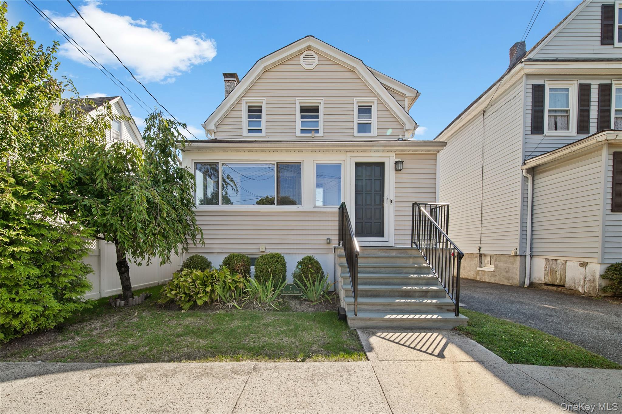 Move-in ready and tucked away on a quiet one-way street in the sought-after Chatsworth Avenue School district, this charming 3-bedroom, 2.5-bath Colonial offers the perfect blend of character, modern updates, and convenience. The open-concept kitchen with recessed lighting, high ceilings, and a stunning gas fireplace flows into sun-filled living spaces with hardwood floors throughout. Recent upgrades include energy-efficient Okna windows and a fresh coat of paint. Additional features include a beautiful sunroom, spacious deck, and a 2-car garage with storage. With low taxes, no flood zone concerns, and no Thruway or railroad noise, this is a rare Larchmont find—just minutes from Manor Beach and the rights to use it, the Long Island Sound, Pryer Manor Marsh & Preserve, local shops, and all three Mamaroneck schools: elementary, middle, and high school.