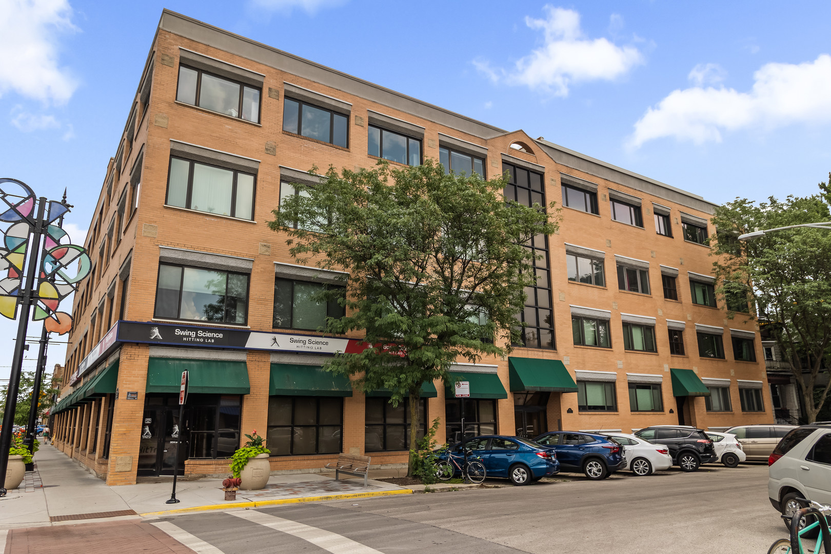 Live the Lincoln Square lifestyle in this bright and stylish 2 bed, 2 bath condo at 4751 N Artesian Ave! Soaring 11-foot ceilings, cherry hardwood floors, a gas fireplace, and oversized windows create a warm, loft-like feel, while the updated kitchen features granite counters, stainless appliances, and a large island. The spacious primary suite includes a large closet and double vanity bath, plus enjoy in-unit laundry, heated garage parking, two storage units, a shared courtyard, and rooftop deck. Steps to parks, shops, dining, and the Brown Line-schedule your showing today and make this gem yours!