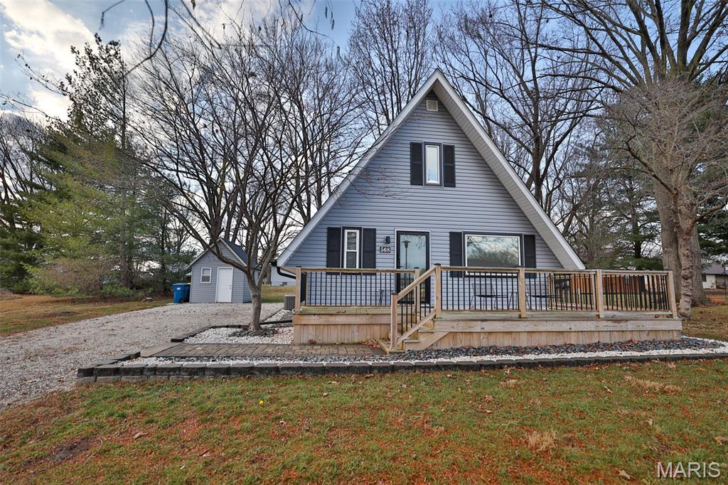 Welcome home! Completely updated inside and out between 2021-2025, this home is ready for you to enjoy all that Holiday Shores offers this summer. The kitchen features new cabinetry, countertops, a center island, and stainless steel appliances. Throughout the home, you’ll find new flooring, fresh paint, updated lighting, a new AC unit, a new water heater, and an updated bathroom. Front windows have been replaced, the crawlspace has been waterproofed by Woods Basement, and all landscaping has been refreshed.Outside, both the house and shed have new roofs and siding. With these extensive updates, you can move in with confidence—it’s practically a brand-new home.