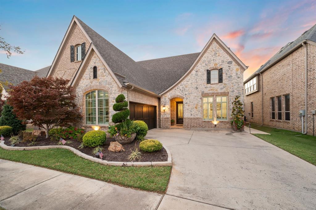 Welcome to this beautiful, lovingly maintained home in the private, gated community of Preservation in the heart of Colleyville and just blocks away from a variety of shops and restaurants and a quick drive to DFW airport! As you pull up to the home, mature landscaping greets you with the HOA maintaining the front and side yard and the 2 car garage offers ample storage space with built in cabinets with shelving. Handscraped hardwood floors flow throughout and seamlessly connect the designated office space to the elegant formal dining room. The eat-in chefs kitchen is a standout, featuring a recently installed Wolf stovetop, a sleek backsplash for easy maintenance, level 8 quartz countertops and an expansive island, wine fridge, custom pull-out soft close cabinet shelves and the custom pantry is designed to fit small appliances and has a butcher block countertop. The primary suite is a true retreat with a soaking tub, separate shower with a new shower head, and a spacious walk in closet with optimal storage space. Outside is a personal oasis with a covered patio with UV screens, custom lighting, while turf provides easy care and maintenance. The oversized covered patio with an outdoor kitchen and built in grill, bar and seating provides the perfect spot for entertaining or unwinding. This home truly has it all, come see it today!