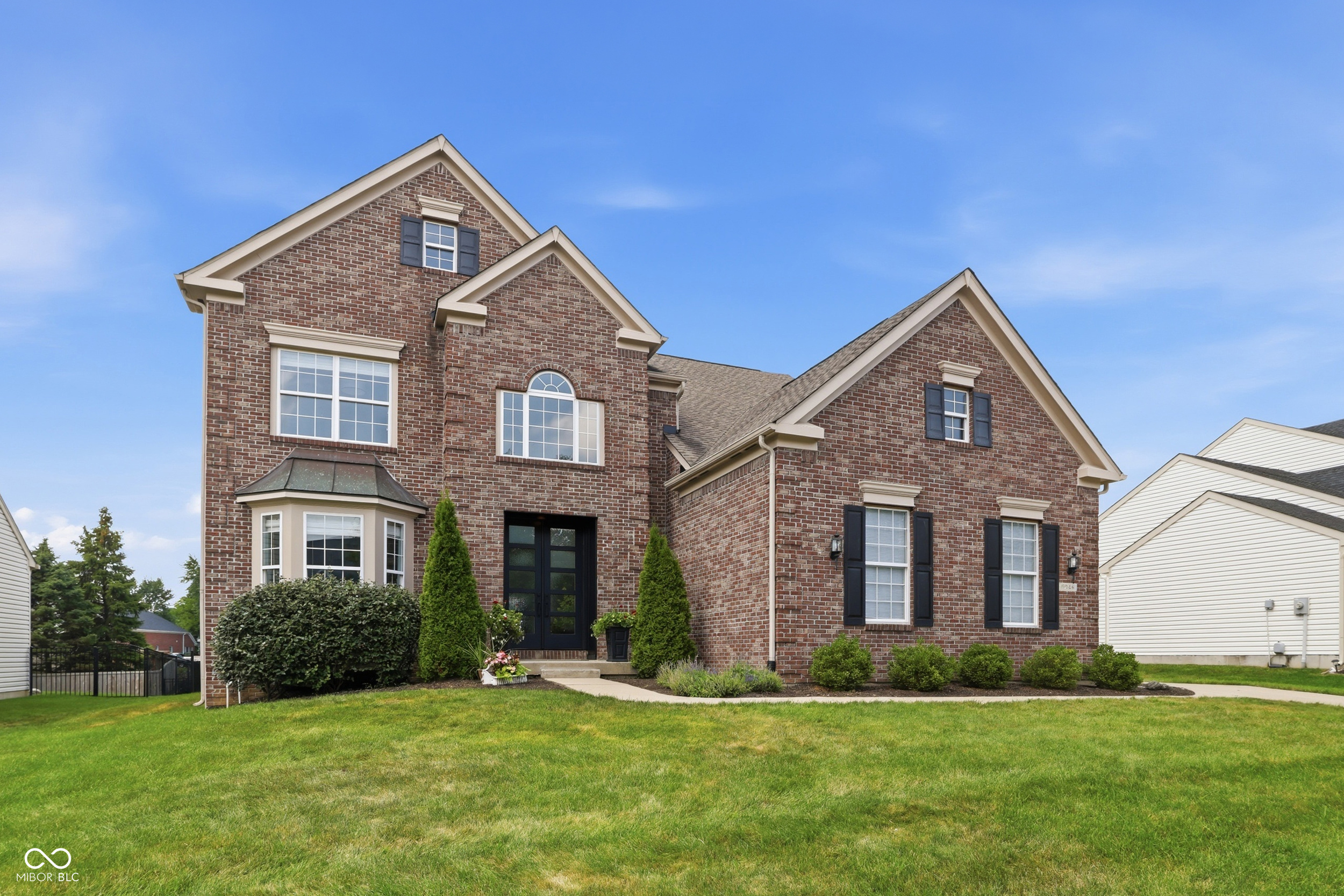 Discover refined living at 11946 Bird Key BLVD in Fishers, IN. This attractive single-family residence, built in 2002, offers over 4,000 square feet of living area and is presented in great condition. Its traditional architectural style and beautiful double door entry provides a timeless appeal, setting the stage for a comfortable and engaging lifestyle. The kitchen is designed for all of your social gatherings, featuring an updated island with storage and a lovely breakfast area. You will fall in love with the newly added sunroom addition which offers a beautiful fireplace, wood beams on the ceiling and can be enjoyed year round with both heat and air. The two story great room is open to the inviting kitchen and has lots of natural sunlight. The primary suite includes updated flooring, a generous walk in closet, double sinks with a soaking tub and separate shower. Three additional bedrooms on the upper and a large office on the main will give you plenty of wonderful living space. Great basement space to make your own. This property extends its appeal outdoors with irrigation, a fenced backyard & patio & pergola offering a personal retreat for relaxation or recreation.