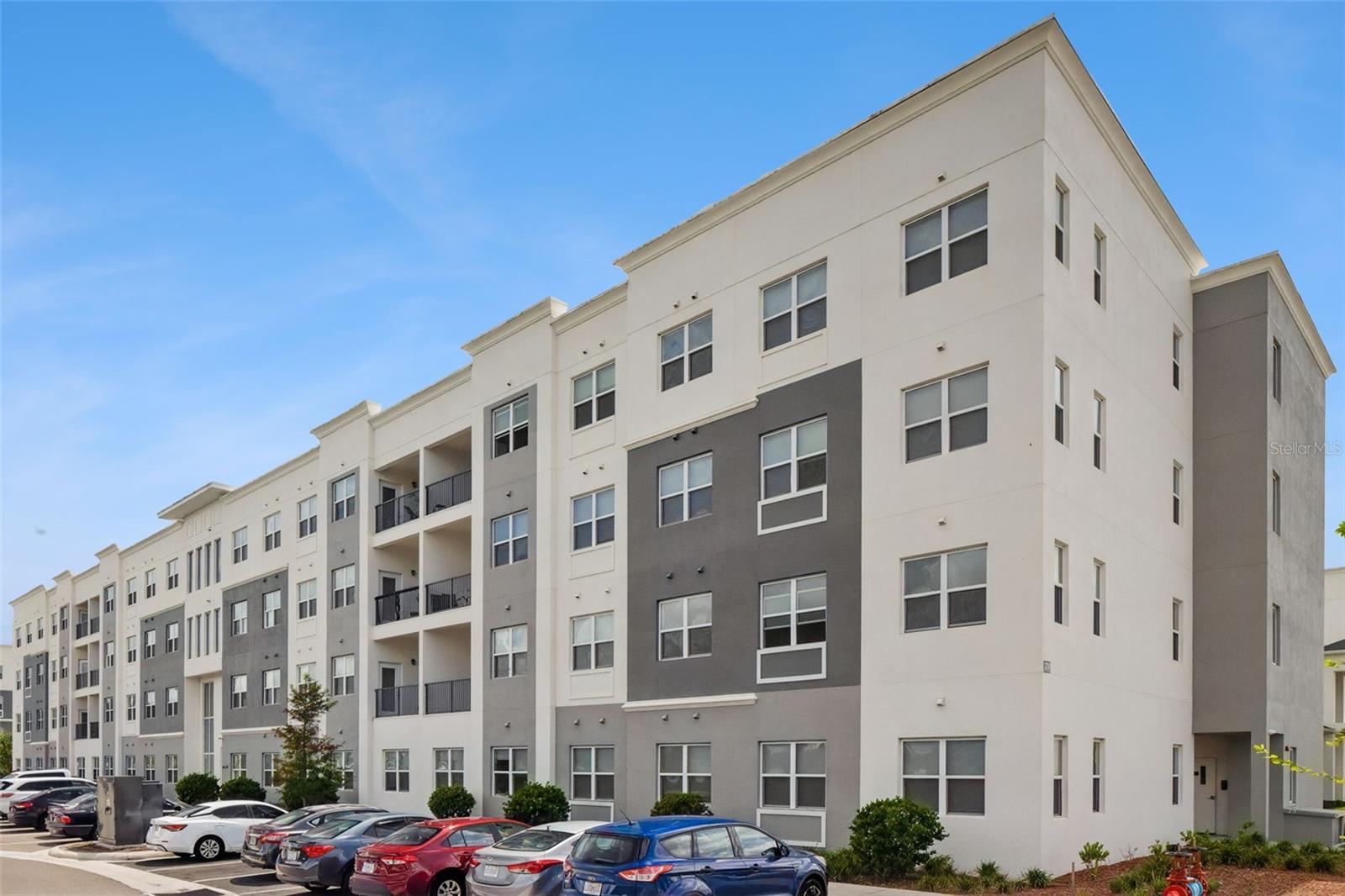 Wouldn't you like to own a brand new condominium in Orlando, and one which has never been lived in before?  Now that dream can become a reality at 1210 Southstation Place.  This modern condominium offers a balanced blend of modern touches with elegant finishes, including laminate flooring in every room; granite countertops in the kitchen, frameless cabinetry & stainless steel appliances to set the backdrop in the kitchen.  Room for four bar stools makes this the perfect spot to entertain your guests or host those family get-togethers.  Your primary bedroom is conveniently located on one side of the condominium, with it's very own walk-in closet and well-updated en-suite bathroom, while two other (generously sized) bedrooms are located on the other side, making this a thought-through floorplan. Take advantage of the brand new on-site amenities such as the swimming pool, clubhouse and fitness center.  In addition, multiple retail stores are also planned for the community by the main entrance >> LOW HOA | MULTIPLE ELEVATORS | RESORT STYLE POOL & FITNESS CENTER | WALK TO THE SUNRAIL STATION | 24-7 SECURE ACCESS | 100% BRAND NEW CONDOMINIUM - NEVER LIVED IN