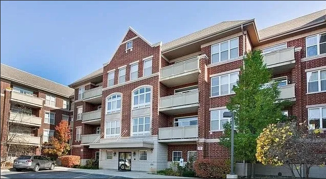 1,560 sq ft condominium features 2 spacious bedrooms and 2 full bathrooms, located at 77 N Quentin Rd, Unit 202, Palatine, IL 60067. The home offers a prime location and includes granite countertops, stainless steel appliances, in-unit washer and dryer, hardwood floors, a heated indoor parking space, and access to an on-site fitness center. The listing agent has an ownership interest in the property.
