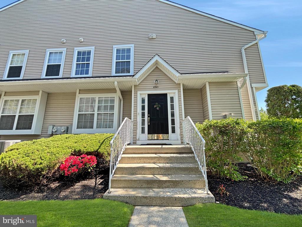 Welcome to 6901 Baltimore Drive, a beautifully maintained end-unit townhome in the highly desirable Delancey Place community! Offering approximately 1,688 square feet of comfortable living space, this 3-bedroom, 2.5-bath home combines classic design with modern updates in a prime location within the sought-after Evesham School District.Step inside through the center hall foyer and immediately appreciate the traditional, well-designed floor plan. To the left, a spacious living room flows seamlessly into the formal dining room—perfect for hosting gatherings and special occasions. The adjacent kitchen features abundant cabinetry, gas cooking, a built-in microwave, and updated appliances, with easy access to the dining area for everyday convenience. A half bath and pantry are also located on the main level.At the rear of the home, relax in the inviting family room highlighted by a cozy gas fireplace—ideal for unwinding or entertaining. Sliding doors fill the space with natural light and provide access to the outdoor area.Upstairs, the primary suite offers a private retreat with a full en-suite bath and a walk-in closet. Two additional generously sized bedrooms share a full hall bath, and the convenience of a second-floor laundry room adds to the home’s thoughtful layout.The full basement provides endless possibilities—whether you envision additional living space, a home gym, or simply need ample storage, this feature adds both value and flexibility.Additional upgrades include a newer roof (4 years old), HVAC system (2022), and water heater (2020), offering peace of mind for years to come.Situated in a beautifully maintained community with manicured landscaping, this home also benefits from a highly convenient location close to shopping, dining, major roadways, and top-rated schools.Don’t miss the opportunity to own this spacious and well-appointed end-unit townhome—schedule your private showing today!