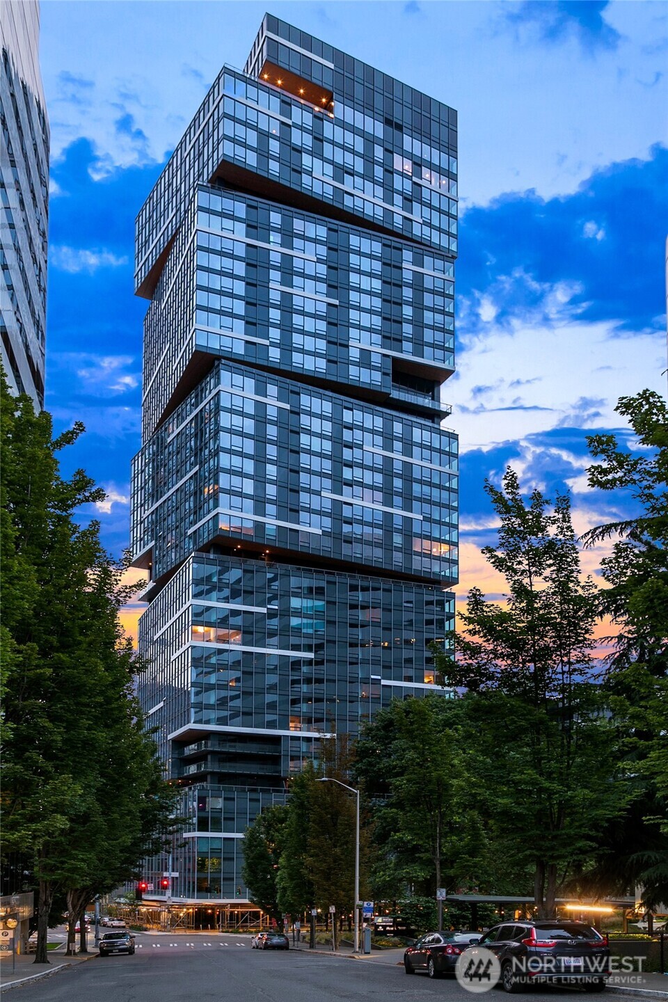 PH203 at The Nexus is a rare 3,000-sq-ft penthouse offering sweeping panoramic views. Completed in 2020, this 3-bed, 3-bath home blends modern luxury with floor-to-ceiling windows, refined finishes, and expansive open living spaces. Enjoy a primary suite with a five piece bathroom and a walk-in closet. Home also comes with and a full second guest suite. Two additional bedrooms that overlook the city. The Nexus elevates daily living with concierge service, fitness center, dog and media lounges, plus the 41st-floor Sky Club with exhibition kitchen, private dining, lounge, and terrace. This home comes with six parking spaces and two storage units included. Ideally located in downtown Seattle for those seeking sophisticated urban living.