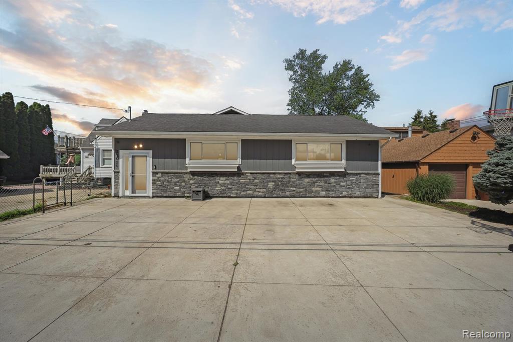 THIS HOME IS TRULY A WOW - A Summertime Dream Home - that is set up to entertain all year long (both inside and outside).  From the moment you pull up to this Waterfront home you know that it is EXTRA SPECIAL! Walking into the foyer with an entrance hallway that immediately makes you feel like you are Home.  The entrance foyer opens up to a Gorgeous Kitchen with a wide-open concept where the entertaining can be endless.  The Dining Room table area and barstool area is perfect for plenty of friends and family gatherings. The Living/Great  Room has a beautiful Natural Fireplace where you can cuddle up in the winter months and enjoy the beautiful Winter Scenes. 3 Energy Star Qualified Skylights that brings the Sunshine in.  This Home has 3 Bedrooms that feature very large rooms, tons of closet space (3rd bedroom has a water view).  The Primary Bathroom has a beautiful separate shower and a jetted soaker tub where you have continuous hot water (throughout this home), perfect for your own private getaway.  Don't forget the 4-Season Room where you can relax and enjoy all that surrounds you.  The View to the water lets you know right away that you are in a water community that is ready for lots of fun and water sports;  There is a boat dock that accommodates up to a 40' boat, with a 10,000 pounds inside lift with remote and a Jet Ski Lift.  There are 3 outside boat wells.   * SEA WALL *In addition all the appliances (stainless steel) are including but not limited to the Refrigerator Stove, Dishwasher, Microwave.  Don't forget your laundry room is off the Master Bedroom for convenience.  Washer and Dryer are also included. Updates include electrical, furnace and central air (approx. 2015). BATVAI  (FURTHER DESCRIPTION CONTINUED IN AGENT ONLY REMARKS)