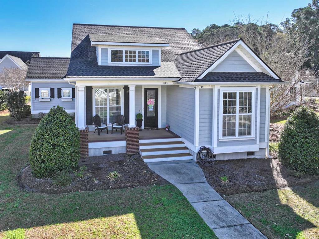 Located in the desirable Madison Grove Subdivision, this charming home offers comfort, style, and convenience in a beautifully maintained community. Neighborhood amenities include a clubhouse complete with a full kitchen and appliances, a gym, a refreshing saltwater pool, and scenic walking paths perfect for daily enjoyment. This 3 Bedroom, 2 bath home welcomes you with hardwood floors throughout most of the main living areas, along with tile in the bathrooms, and cozy carpet in the bedrooms. Higher ceilings create an open, airy feel, complemented by crown molding throughout and wainscoting in the dining area. The split floorplan adds privacy, while granite countertops enhance the home's modern appeal. The open-concept design connects the kitchen to the living room, making it ideal for gatherings. The kitchen includes a spacious four-stool bar for additional seating and functionality. A well-appointed laundry room adds convenience. An added bonus is the garage—highly valued in this area. Recent updates include a roof and A/C unit that are only a few years old, making the home turnkey and ready to enjoy. The master suite offers a peaceful retreat with a generous walk-in closet, a luxury shower, and a relaxing soaking tub. This beautifully updated home blends comfort, elegance, and practicality in one inviting package. Give us a call to set up a tour.