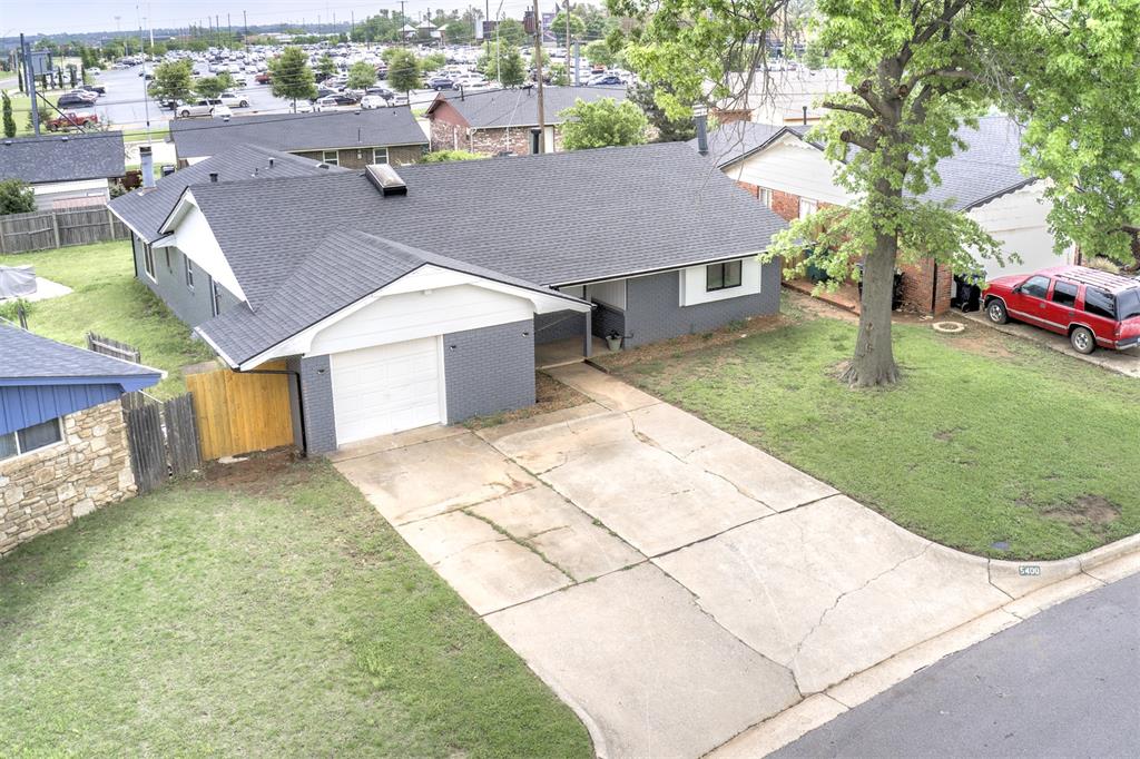 Welcome to this stunningly updated ranch-style gem that is modern, charming, and elegant! Located near the OKC Zoo, Science Museum, and Remington Park, home has quick access to major highways, Tinker AFB, Downtown OKC, Will Rogers Airport, and premier shopping and dining destinations! Boasting 4 generously sized bedrooms and 2.5 beautifully updated bathrooms, this home offers space, style, and comfort for any lifestyle. Step inside to discover an expansive layout featuring high ceilings and an abundance of natural light! The large living area is perfect for relaxing or entertaining with a cozy, woodburning fireplace. Home has beautiful luxury vinyl plank flooring in main areas with newer carpet in bedrooms. You will love the tile work in the updated bathrooms! You’ll fall in love with the gorgeous kitchen, thoughtfully designed with ample counter space, a spacious island, modern fixtures, and updated finishes that make cooking and hosting a breeze. Enjoy meals and entertaining in the formal dining room. Situated on a super spacious lot, there's plenty of room for outdoor activities or future enhancements! This is affordable luxury at its best — don't miss your chance to call this exceptional property home! ***There are grant opportunities available to help with downpayment and closing costs for this property! ***Seller is offering $5,000 towards buyer’s closing costs!