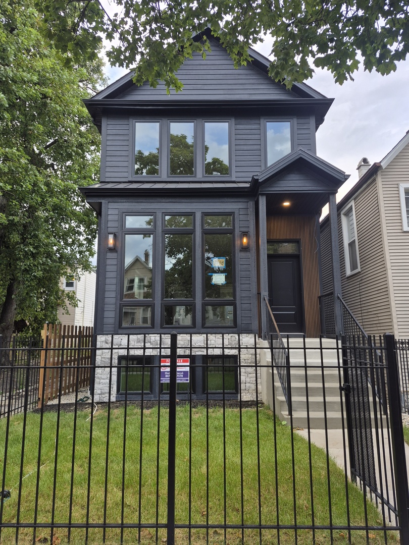 Luxury new construction house in the heart of Logan Square, featuring beautiful finishes and a thoughtfully designed floor plan. Exceptional attention to detail is showcased throughout, including stylish flooring and carefully selected light fixtures.  Step into an inviting main level designed for comfortable family living and effortless entertaining. The elegant kitchen features abundant cabinetry, granite countertops, and premium Wolf and Sub-Zero appliances.  The second floor offers three bedrooms, two bathrooms, and a convenient laundry room, including a spacious, sun-filled primary suite with a luxurious spa-like bath.  The fully finished basement provides an additional bedrooms and bathroom, a large recreation room with a wet bar and beverage refrigerator, plus a second laundry area.  Enjoy a two-car garage with modern deck , perfect for outdoor entertaining and relaxation.  This exceptional home combines modern luxury, functionality, and thoughtful design in a desirable Logan Square location. A must-see!