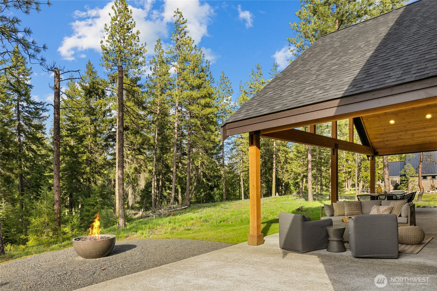 Large covered back patio up against the conservancy.