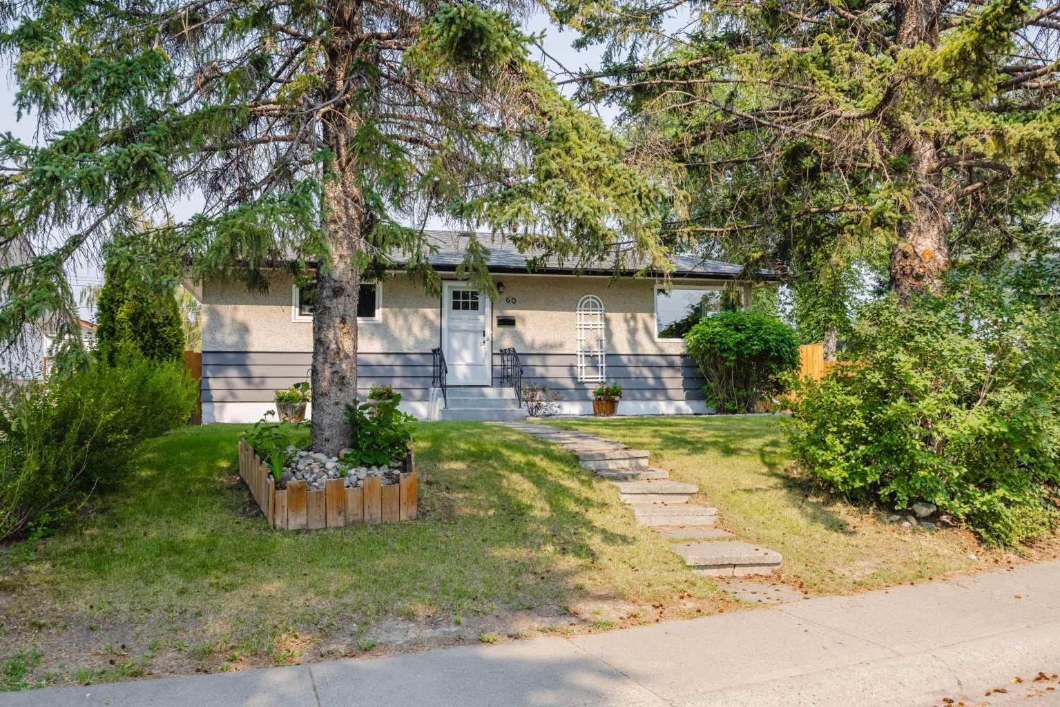 You will LOVE living in one of Calgary’s best-kept secret communities that perfectly balances central connectivity with quiet, small town charm. Nestled among mature trees on a massive lot that easily doubles the yard size of newer communities, this unique property offers great privacy with only one shared fence and a peaceful walkway on the other. Inside, original hardwood floors, thoughtful renovations & upgrades throughout, a floor plan where every square inch is usable, and a stunning south-facing double corner window that floods the space with natural light are just the beginning. The location is a commuter’s dream, placing you central to the entire city with effortless access to Deerfoot Trail for north-south travel, Glenmore Trail for escaping west, and Crowchild Trail for quick trips to the northwest. Beyond the property lines, you will join a tight-knit community of long-term residents who are genuinely friendly and deeply invested in keeping the neighborhood clean and safe. Lifestyle and convenience are unmatched here; you can take a simple stroll up the street to a large off-leash dog park, walk to a beloved local bakery for your morning bread, or take a short drive to the Calgary Farmers' Market, Heritage Drive grocery hubs, and an array of popular local breweries.  No wonder this community has become so popular!  Stake your claim with this 100% MOVE-IN READY home before someone else does!
