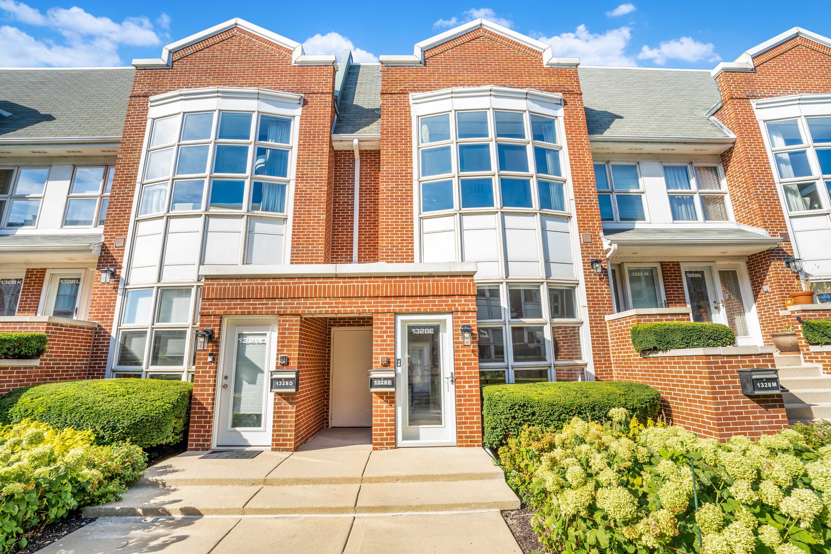 Welcome to 1328 S Federal #E, a stunning two-story townhouse in Chicago's desirable Dearborn Park II community. This spacious home blends classic charm with thoughtful modern updates, offering both comfort and convenience in the vibrant South Loop. Bright living room with gas log fireplace, motorized blinds on a large bay window. The kitchen features a brand-new refrigerator, and a spacious breakfast area. The entire home showcases gleaming hardwood floors, adding to its sophisticated feel. Upstairs, you'll find large bedrooms with ample closet space, including a primary suite with a walk-in closet and sleek modern sliding doors. Enjoy your morning coffee or unwind after a long day on the private, cozy balcony, your personal outdoor retreat in the city. Located just moments from top dining, shopping, parks, and public transportation, this townhouse offers the perfect balance of city living and neighborhood charm. Don't miss the chance to make this Dearborn Park II gem your new home!