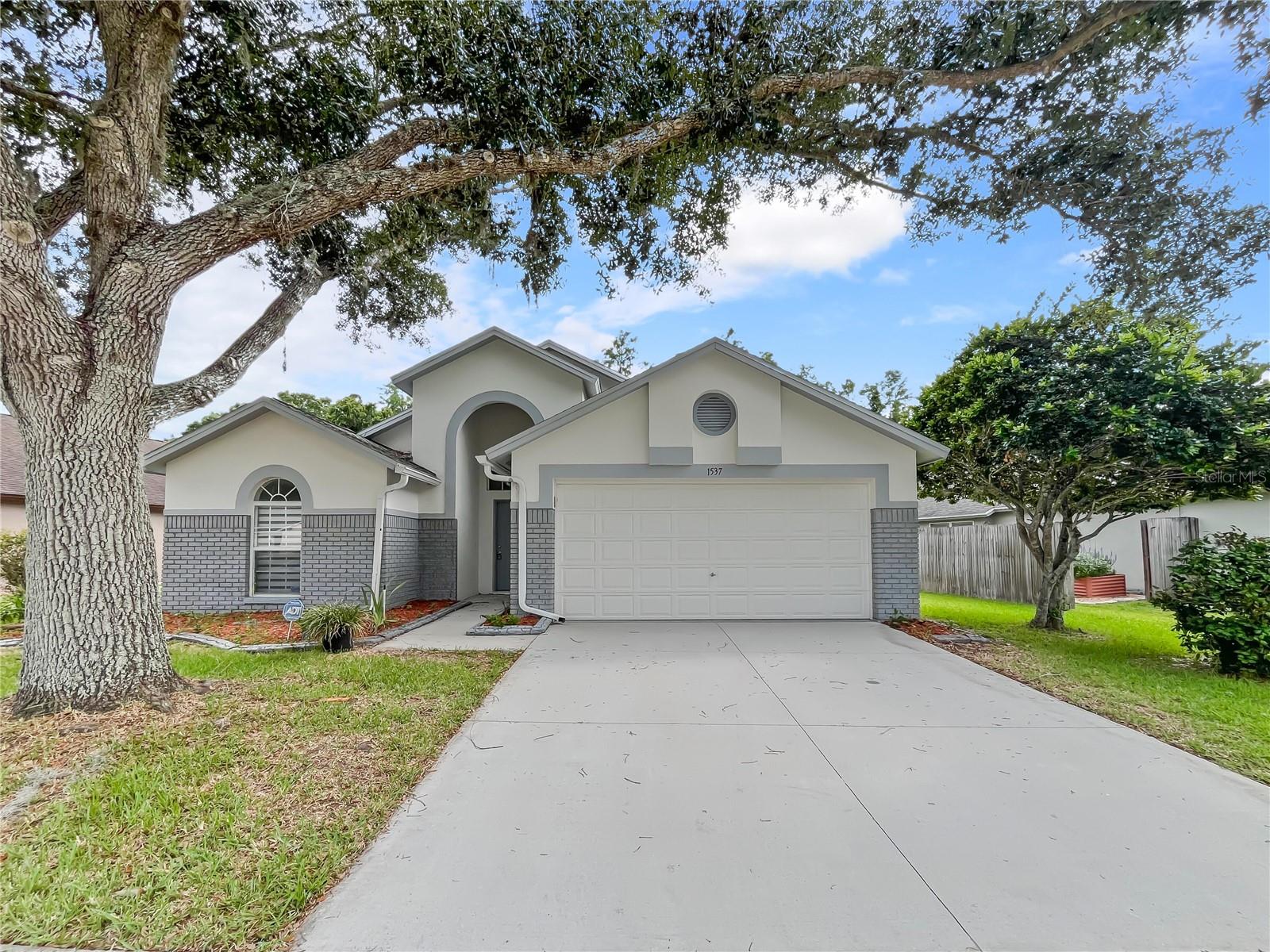 BEAUTIFULLY UPDATED & MOVE IN READY! single-family home located in a NO FLOOD ZONE with NO HOA packed with upgrades and ready for new owners in one of the Best Locations of the county near top-rated schools. The property is a 1 story home of luxurious living space with a fantastic open floor plan, 3 bedrooms, 2 baths and 2 car garage. Enter the home to an open foyer with large open living & dining room area. Beautiful ceramic tile floors and Luxury Wooden laminate mostly throughout. Spacious beautiful BRAND-NEW open kitchen with stunning cabinets, beautiful Quartz countertops, stainless-steel appliances, breakfast bar and upgraded lighting. Brand New AC System. Beautiful spacious Master with walk in closet. Master bath features renovated double sinks with vanity area, garden soak tub, and walk-in shower. Spacious 2nd & 3rd bedrooms with updated 2nd bathroom. Very spacious living room area with high ceiling for entertaining, also Sliding doors open to a private enclosed patio area that invites you to sit & enjoy the day & evenings sun sets.Plenty of backyard space to enjoy BBQ’s with family & friends. Close to all, I-75/275, Tampa International Airport & downtown Tampa, hospitals, shopping malls, schools, golf courses, restaurants.