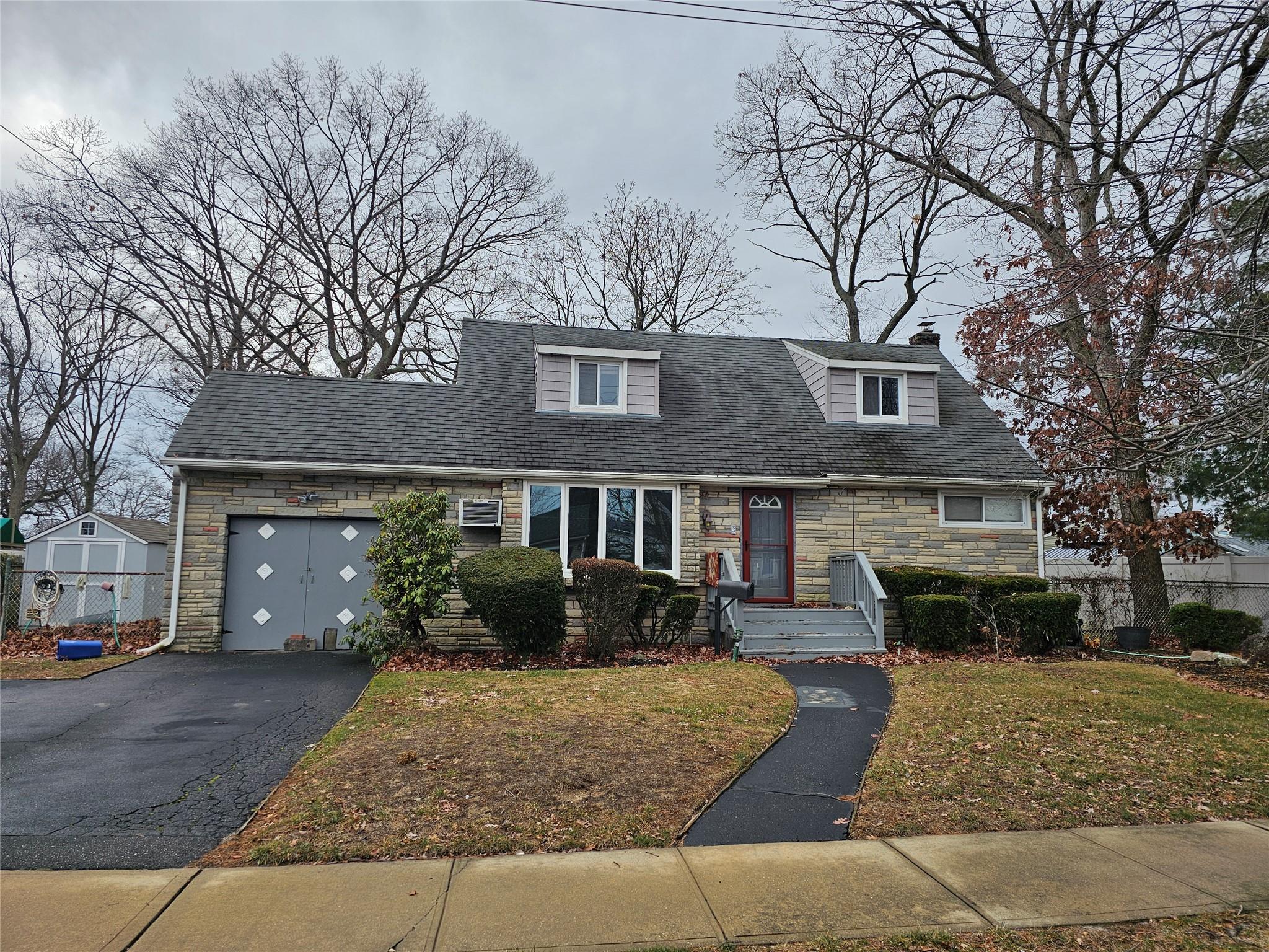Great Opportunity to Make This 1,659 Square Foot Expanded Cape Home Your Own! Located in Massapequa in the Massapequa School District with Living Room, Converted Garage into Sunken Den with High Ceiling and Door to Backyard, Expanded Kitchen with Dining Area and Sliding Doors to Backyard, Bedroom Off of Kitchen, 2 More Bedrooms on 1st Floor with Full Bath with Shower, and 2nd Floor has 2 Bedrooms with Jack 'n Jill Full Bath in Between.  Full Basement with Laundry Area, Boiler Area with Gas Hot Water Heating System and Upgraded Electric. Fully Fenced Yard Which Abuts the Open Grass Area of the Nassau BOCES Carmens Road School.