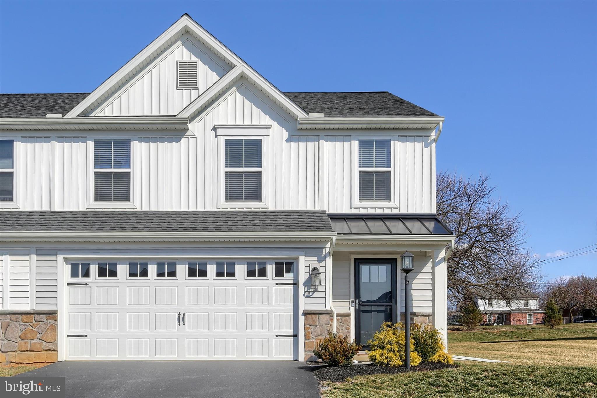 You’ve been waiting for a home like this! This beautifully maintained, three-year-old duplex offers three bedrooms, 2.5 baths, nearly 1,800 square feet, and a two-car garage. The open floor plan allows for plenty of natural light throughout. With an enlarged living room plumbed for a gas fireplace, there is ample space for entertaining.  Key features include LVP flooring throughout the first floor and upgraded carpeting and padding on the second. The kitchen is equipped with granite counters, upgraded soft-close cabinetry, a tile backsplash, pendant and under-cabinet lighting, an island, and a pantry.  The second floor houses three well-sized bedrooms and a laundry room with a sink. The primary suite includes a large walk-in closet, a ceiling fan, and a bath with a double-bowl sink and walk-in shower. Outside, you can enjoy a private patio overlooking a level rear yard. The home is conveniently located in Dickinson Green near local amenities and major routes.  Leave the mowing,  mulching and snow removal behind and enjoy life at 11 Shillington Lane!