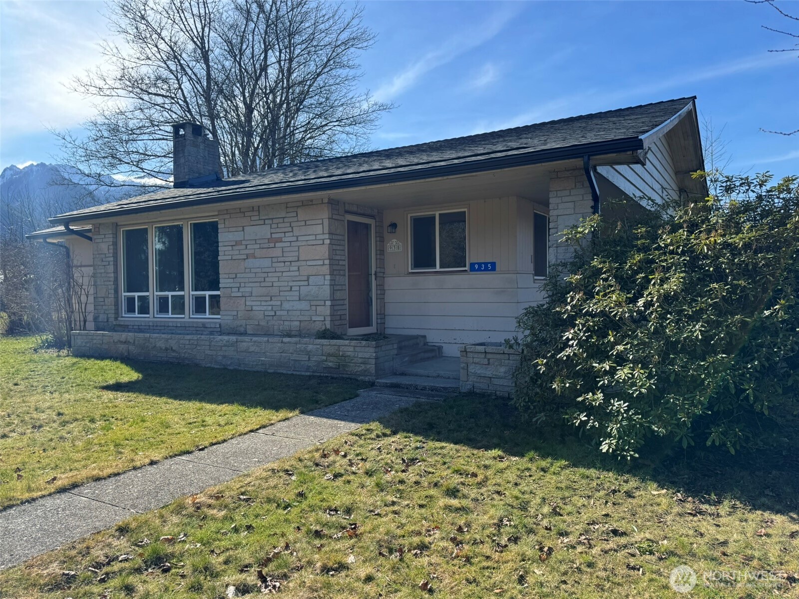 NEW ROOF/GUTTERS & PRICE ADJUSTMENT!! - LARGE RAMBLER ON 5 CITY LOTS - Kitchen, LR, BRs & BTHRMs all located on main level, w/unlimited potential for more living space in the large basement w/separate entrance (rentable?), wood burning FP & decommissioned plumbing in prev bathrm. Updates include: new roof/gutters 2/2026, kitchen appliances, plumbing, electrical panel, septic tank, on-demand hot water & heating system, interior paint & chimney liner. LOADS of built-in storage, sunroom, cedar closets, garage w/hobby rm, corner lot, mountain views, mature fruit trees & landscaping!  Enjoy the added privacy of .44 acres or possibly resell a couple of the lots! So much to offer in this move-in-ready rambler! Buyer verify all.