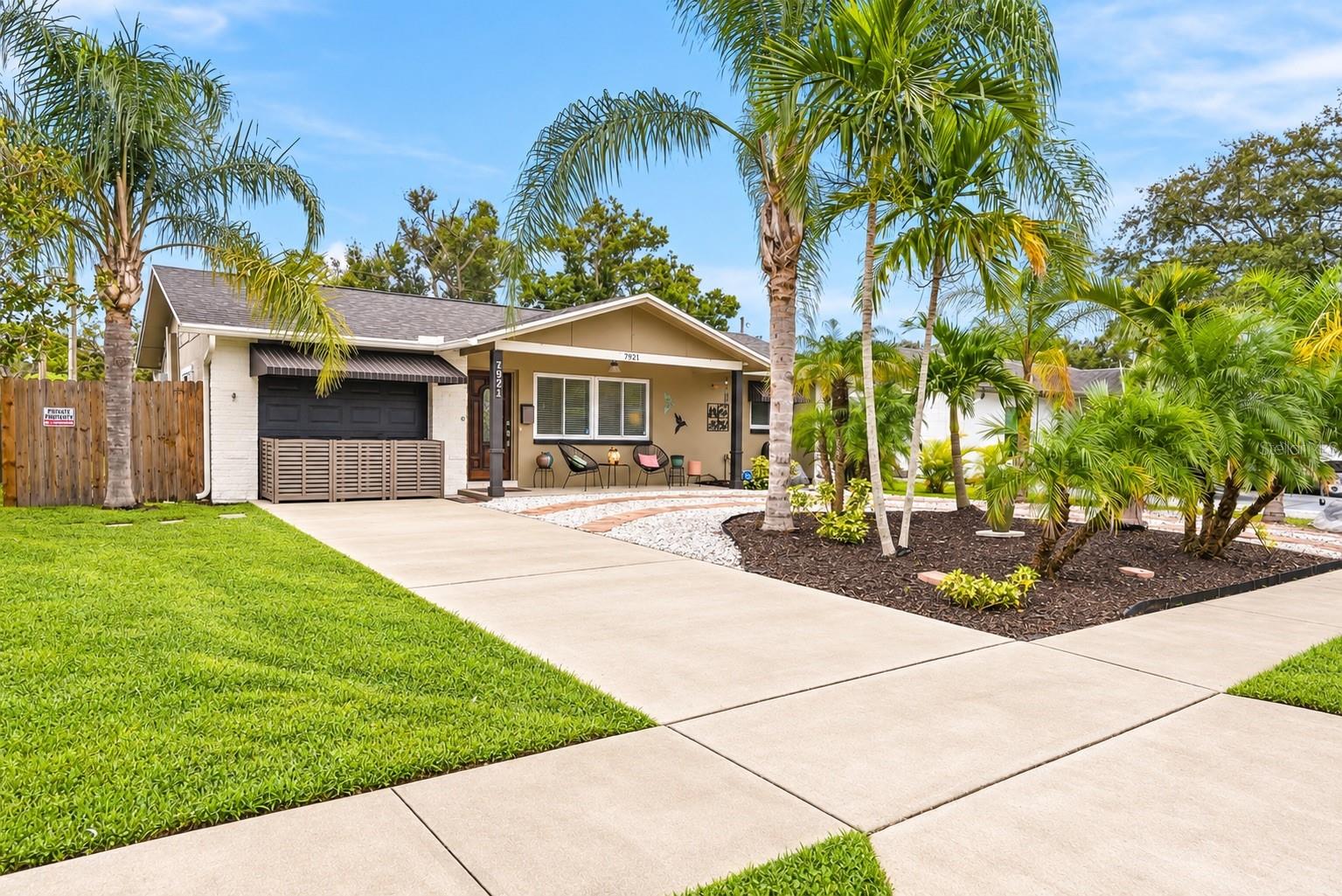 Virtually Staged. MOVE-IN READY, NO HOA, and beautifully updated! This charming 3-bedroom, 2-bath Pinellas Park home combines modern finishes with warm Florida character and an outdoor space you’ll want to enjoy year-round. Step inside to a bright, inviting interior featuring modern LVP flooring throughout—no carpet—tasteful neutral colors, updated lighting, and beautifully renovated kitchen and bathrooms. The kitchen shines with white cabinetry, stainless steel GE appliances, a subway-tile backsplash, stylish hardware, and plenty of workspace, while the updated baths continue the home’s fresh, polished feel.Outside, the home is surrounded by mature tropical landscaping that creates wonderful curb appeal and a relaxed Florida atmosphere. The spacious fenced backyard offers plenty of room to entertain, garden, play, or simply unwind, complete with a covered patio and additional paved outdoor living space.Major improvements add even more value, including a 2019 roof, 2023 HVAC system, 2022 kitchen appliances, and 2024 water heater. With NO HOA, a generous approximately 60' x 128' lot, and thoughtful updates already completed, this home is ready for its next owner. Conveniently located in the heart of Pinellas County with easy access to St. Petersburg, Tampa, shopping, dining, and the Gulf beaches. Schedule your showing today!