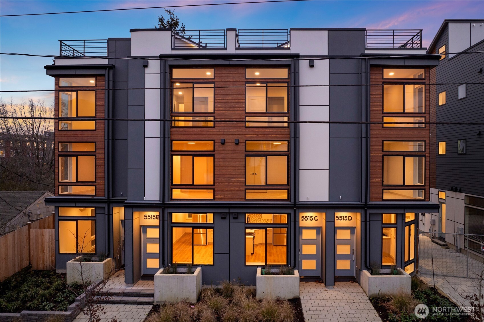 1-year lender paid rate buydown incentive! Welcome to Arden, a boutique collection of modern homes by MRN Homes in an ideal pocket of Ballard. EV-READY PARKING INCLUDED. This well-proportioned residence is filled with natural light from expansive windows, creating a bright, open feel throughout. The open-concept living space features refined modern finishes & a beautifully designed kitchen ideal for everyday living or entertaining. Two good-sized bedrooms + two baths offer a flexible, functional layout, while mini-split heat + A/C provide year-round comfort. Upstairs, your private rooftop deck offers tranquil views & seamless indoor/outdoor living—an inviting setting for BBQs, entertaining or relaxing. With a 94 Walk Score & Bike Score, enjoy nearby cafés, restaurants, breweries, boutiques & the Ballard Farmers Market, plus easy access to the Ballard Locks, waterfront & Golden Gardens. Not a condo + no HOA dues.