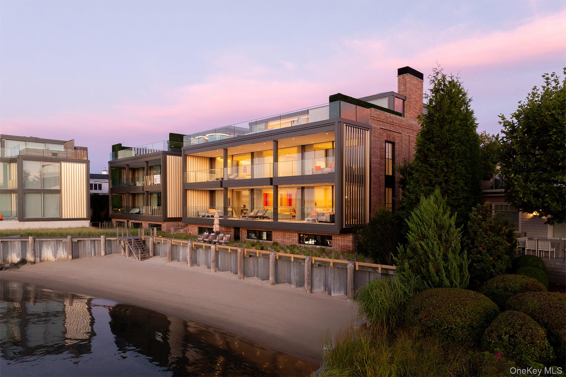 2 West Water Street: The Zenith of Maritime ModernismIn the historic heart of Sag Harbor-a village defined by its whaling heritage and contemporary cultural gravity-Residence A emerges as a singular architectural achievement. Occupying a commanding 250'+/- of prime water frontage, this estate is not merely a residence; it is a four-level masterwork of light, glass, and stone, curated for the global citizen who demands total discretion alongside unrivaled nautical access. This unparalleled pedigree is a collaborative triumph between the visionary J. Bialsky of Bialsky Premiere Design & Development and the world-renowned Hollander Design Landscape Architects, the property represents a seamless dialogue between the built environment and the Peconic Bay. Every line is intentional, every view is framed, and every material is selected for its ability to withstand the coastal elements while maintaining a refined aesthetic. Spanning a staggering 16,974 SF+/- of total living space, the residence is designed as a vertical sanctuary, where grand-scale entertaining meets quiet, private retreat. The interior volume boasts 12,551 SF+/- of meticulously crafted interiors featuring a palette of organic textures and state-of-the-art finishes. The layout accommodates 8 palatial bedrooms and 10 bespoke bathrooms, ensuring ample space for family, guests, and live-in staff. An outdoor al fresco experience of tiered terraces and lounge decks provide a multi-sensory connection to the water. With a rooftop sanctuary, a crowning achievement, featuring a private pool and spa suspended above the harbor, offering a 360-degree vantage point of Sag Harbor's gold-coast sunsets. For the yachting enthusiast, the property offers a level of utility rarely found in private residential real estate. Exclusive marina access: The estate includes a private, deep-water marina featuring two 60' boat slips. Located at the epicenter of the Hamptons' maritime scene, providing immediate access to the open Atlantic or the sheltered coves of the Shelter Island Sound. Beyond the views, the residence functions with the precision of a high-tech fortress. From the secure private garage parking-a rare luxury in the village-to the integrated smart-home systems that manage climate, lighting, and security from anywhere in the world, This residence is the ultimate turn-key asset for the high-net-worth portfolio.