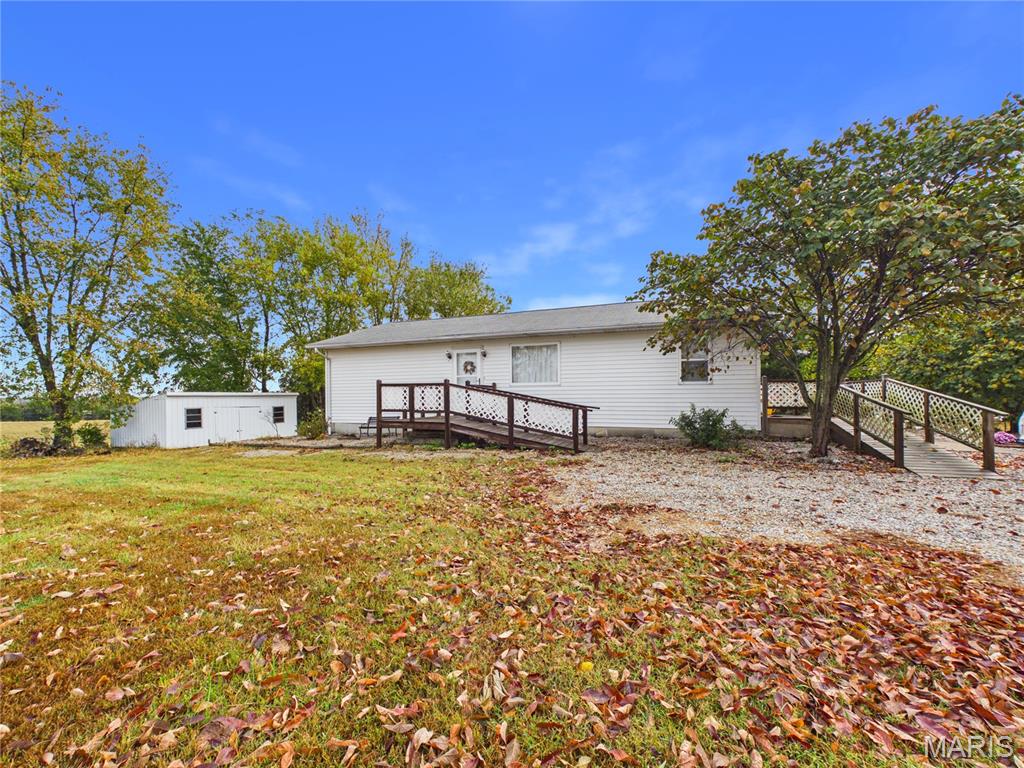 Charming rural living awaits!! This delightful 2-bedroom, 1-bathroom home is nestled on a spacious, fully fenced 1-acre lot, offering the perfect blend of privacy, country serenity, and everyday convenience. The property also features a partially finished basement with multiple outdoor sheds! Boasting a generous sized detached 2-car garage, providing excellent storage for vehicles, tools, or a dedicated workshop space. The expansive acreage is ideal for pets, gardening, or simply enjoying the peaceful Missouri countryside. Don't miss your chance to own a slice of rural paradise with easy access to all the charm and history Ste Genevieve has to offer!