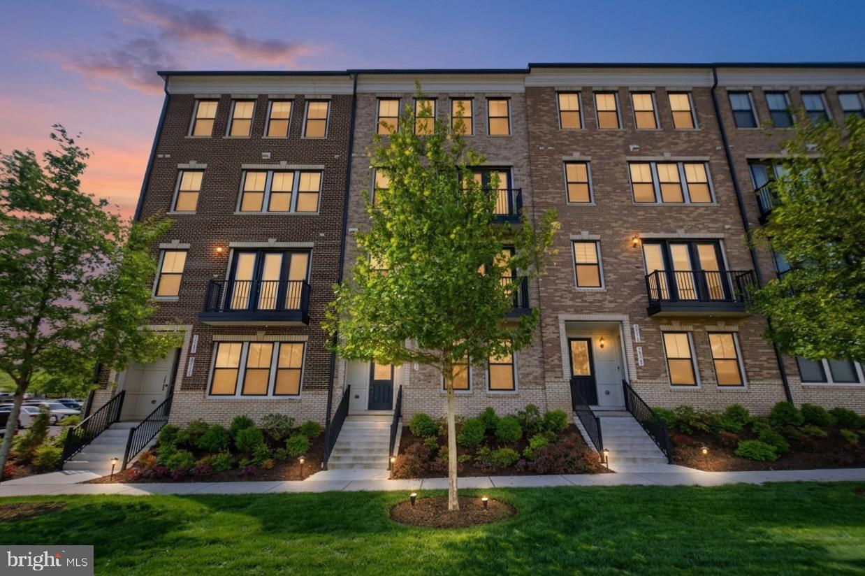 Walk to Harris Teeter, restaurants, cafes, and bars. No car needed. That is Goose Creek Village.Three bedrooms, four bathrooms, one car garage, and plenty of parking. 2,196 sq ft with views from both the main living area and the primary suite that will make you stop and take it all in.The kitchen has everything you want: quartz island, gas range, stainless steel appliances, and subway tile backsplash, all open to the living area where the light comes in. Premium LVP flooring runs the full main level. The primary suite offers a frameless glass shower, double vanity, upgraded tile, and a walk-in closet built to handle a real wardrobe.The HOA takes care of the exterior, lawn, snow, and trash, plus full access to the pool, fitness center, and tennis courts. You handle nothing.Ashburn Metro Silver Line: 5 minutes. Dulles Airport: 10 minutes. Loudoun County Parkway and Dulles Greenway: direct access.Come see it for yourself. Schedule your private tour today.