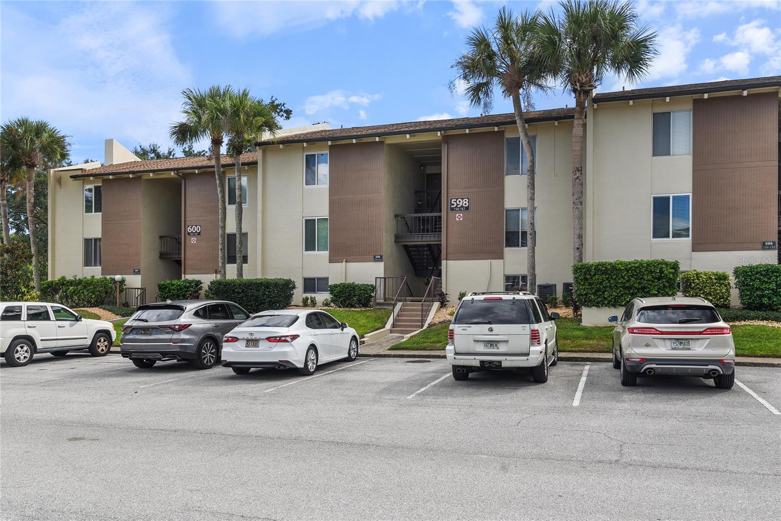 Discover the peaceful charm of lakefront Sandy Cove community, where Oaks, swimming pools, and lakeside amenities create a serene atmosphere. This charming first floor, poolside, move-in ready condo makes an excellent residence or rental property with a convenient location that puts you near all the activities of Altamonte Springs. Enjoy a freshly painted 1-Bed/1-Bath unit overlooking a sparkling pool and courtyard from your living room and screen-enclosed patio perfect for relaxing and entertaining. With nearly 600 square feet of living space, this ground-floor unit offers a practical layout for comfortable everyday living with spacious rooms and large walk in closets for plenty of storage space. You’ll appreciate the functional kitchen layout, combined living and dining area, and tile flooring throughout the main living area, providing durability and ease of maintenance. Sandy Cove community features three community pools, sand volleyball, waterside tennis court, fishing pier, boat storage, private boat ramp to Lake Orienta, boat or paddle board storage, picnic and grill areas, lakeside gazebo, and multiple on-site app-operated laundry facilities. Perfectly situated just minutes from the Altamonte Mall, vibrant Uptown Altamonte, Cranes Roost Park, AdventHealth, and a variety of shopping, dining, and entertainment options. Quick access to I-4 ensures easy commuting, while nearby parks and cultural attractions offering endless opportunities for recreation and relaxation. Whether you are looking for a vacation getaway, investment property, or primary residence, this condo offering flexibility for all your needs. [Prospective buyers must be approved by the condominium association, which retains the right of first refusal. It is the responsibility of the buyer’s agent to submit the required application not less than fifteen (15) business days prior to closing.]