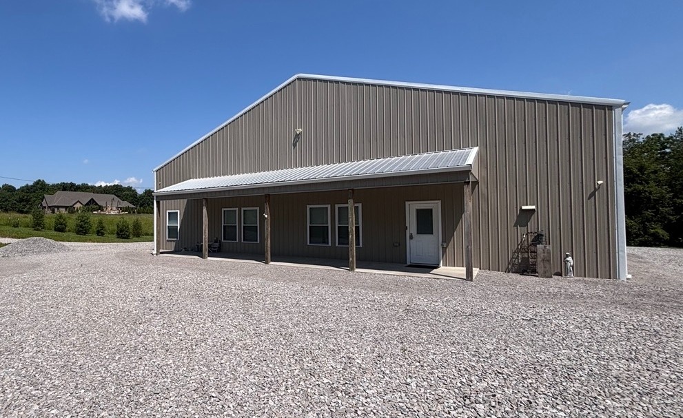 Barndominium residence with about 40 Acres of beautiful rural wooded and pasture land bordering Passenger Creek for about 1400 ft.  Year-round fresh water spring.  Potential hunting lodge; fantastic hunting to include deer, turkey, dove, rabbit and squirrel.  Master bedroom w/ large double shower, double vanity, and walk-in closet.  It has a wonderful kitchen with huge walk-in pantry.  It has a second full bthrm, large entertain. room, storage room, and a huge unfinished 1900 sqft  2-car garage convertible to added living space. The home can be expanded to multiple bdrms, but must add additional footage to the septic system.  This potential future development property located in Sango will include Map 85 Parcel 010.03. Very reasonable access exists to I-24, Clarksville, and Nashville.