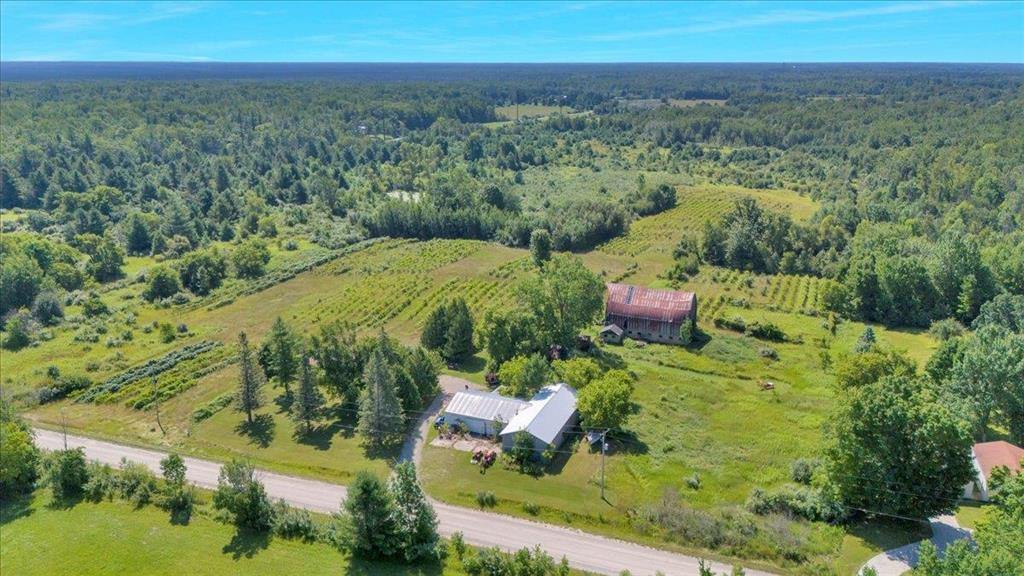 Here is a chance at a 3 bedroom, pole barn, and 57 acres of land. This property was a vineyard. Rolling hills, partially wooded, deer galore. Property goes all the way to Towerline Rd. Huge pole barn with upgraded electrical, office area, and room for many toys. Clear this land and farm it, grow grapes, or just enjoy some elbow room. The home is all one level living, hardwood floors, and a full basement. This place is ready for its next adventure. Some pictures of the home are virtually staged.