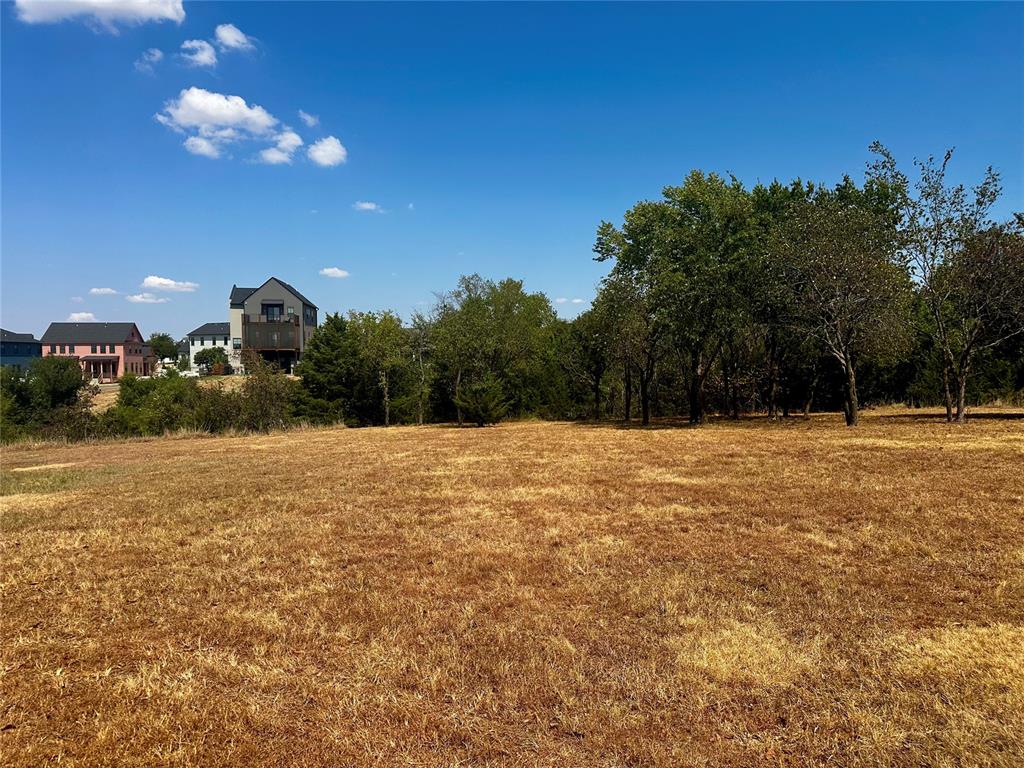 Introducing The Cottages at Selah Phase 1. This beautiful homesite offers a rare opportunity to enjoy peaceful country living with walking trails to horses, alpacas, vineyards, and unforgettable Oklahoma sunsets from your back porch. This particular lot backs up to a 2.5 acre pond enhancing the charm and character of the setting. Located just a couple of miles down a quiet country road and only 10 minutes south of historic Norman, Selah is an up-and-coming wellness community unlike anything else in Oklahoma. Set on 540 acres, Selah is designed around front porch living, fresh air, fresh food, and meaningful connection with family and neighbors. This walkable community features preserved green space, miles of nature trails, restaurants, arts, businesses, and thoughtfully designed gathering places. With internationally recognized architects and design professionals helping bring the vision to life, Selah is setting a new standard for Oklahoma living—one inspired by the past and built for the future. Call today for more information about this lot and other available opportunities in the Selah community.