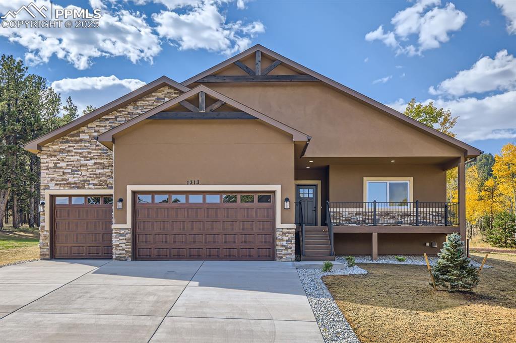 Welcome to convenient mountain living on a corner lot in the desired neighborhood of Stone Ridge Village in Woodland Park, CO. This brand new ranch style home features over 2,000 sq. ft., 4 bedrooms, 2 bathrooms, and 3-car garage all laid out in an open floor plan. You will be greeted by a covered entryway into a large foyer that opens up to the expansive open floor plan. You'll notice the great room that has a high efficiency 35,000 BTU gas fireplace (will effectively heat the entire home) finished in floor-to-ceiling stone, a walk-out dining room, a top-notch kitchen with superior granite countertops & custom soft-close cabinetry, a large island and a walk-in pantry. As you enter the home, on your right, you'll see a well-lit office that can also serve as a functioning bedroom. Every detail was thought out in this home to include upgraded insulation, tankless water heater, solid core doors, a radon mitigation system, custom soft-close cabinetry, granite countertops, heated crawl space, engineered flooring, a large linen closet in the master bathroom, landscaping, and upgraded Mezzo windows. Notice in the oversized 3-car garage the electric car charger, the epoxy covered floors, and the hot/cold spigot making it easy to wash your car. Enjoy the Colorado air by stepping onto the large covered patio that overlooks your already established yard and is accessible from both the dining room and the master bedroom. There is nothing that this home and floor plan doesn't offer - plenty of space for entertainment, guests visiting, individual space for quiet time, work-from-home space, food storage, work space in the garage, and a large corner lot located just minutes from everything Woodland Park has to offer.