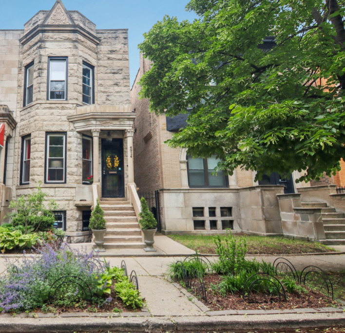 Completely rehabbed in 2018, this beautifully updated 4BD/3.5BA Greystone blends historic charm with modern upgrades. Original woodwork and early 1900s architecture are preserved alongside a stylish kitchen (updated 2021) and sleek bathrooms (primary en-suite updated 2022). Main level features spacious living room, formal dining with dry bar, modern kitchen, and family room. Upstairs offers 3 sun-filled bedrooms and 2 full baths. Finished basement includes 4th bedroom, full bathroom, and plenty of entertainment space. Enjoy the rear deck (added 2022) and secure parking pad with automated electric gate-fits mid-size car or SUV. Located on landmarked Washington Park Ct block, near schools, parks, and I-90. Move-in ready!