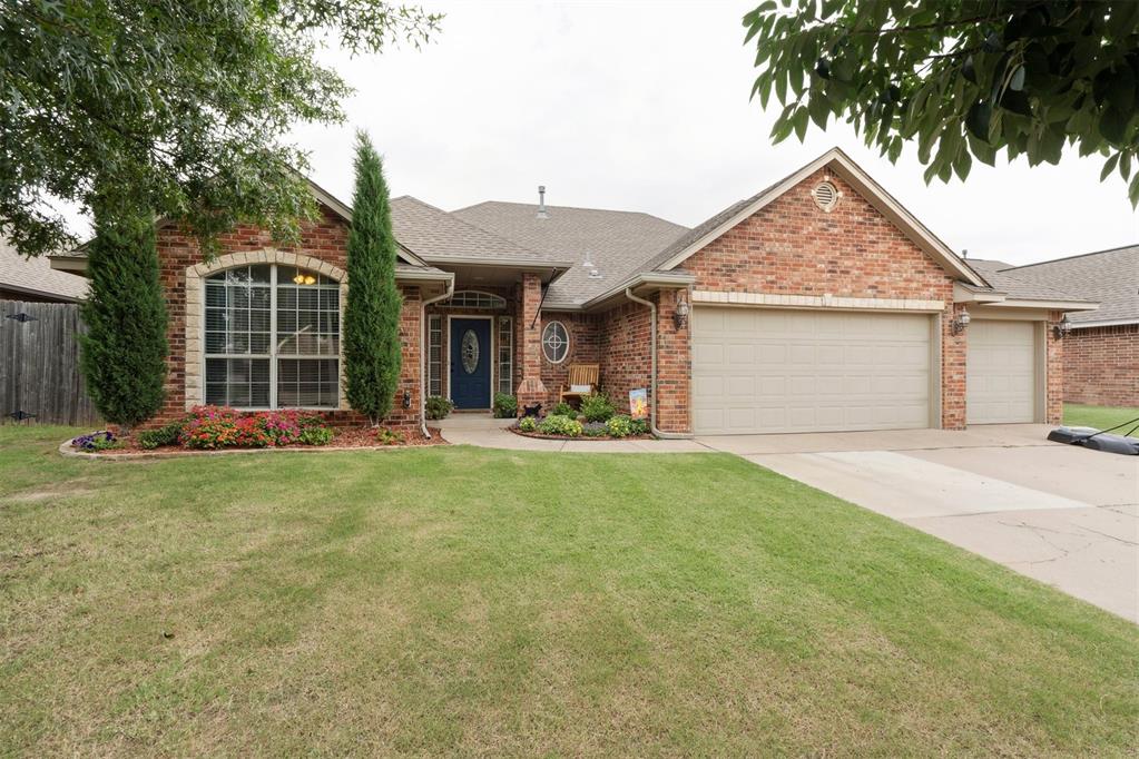 Lovingly cared for home in the sweet neighborhood of Chapel Creek!  This 4 bedroom home boasts a gorgeous and expanded back patio with a large covered pergola and landscape that won't disappoint anyone.  The home has been updated inside as well by adding wood look tile throughout including the bedrooms and all fresh paint inside.  High ceilings create a spacious feel with a gas fireplace as the center of the home.  The Primary bedroom and one secondary bedroom are on one side of the home.  The second bedroom closest to the Primary has a closet and privacy door but would make a nice study if needed.  The other 2 bedrooms on the opposite side of the home.  The hot water heater was replaced this year and there are 2 new toilets as well.  The 3 car garage has a floor built storm shelter for added piece of mind.  The roof was replaced in 2022.  Mature trees will keep the home cool and add beauty to an already exquisite home scape.  Piedmont schools are a huge plus if needed!  Don't miss this pristine home!