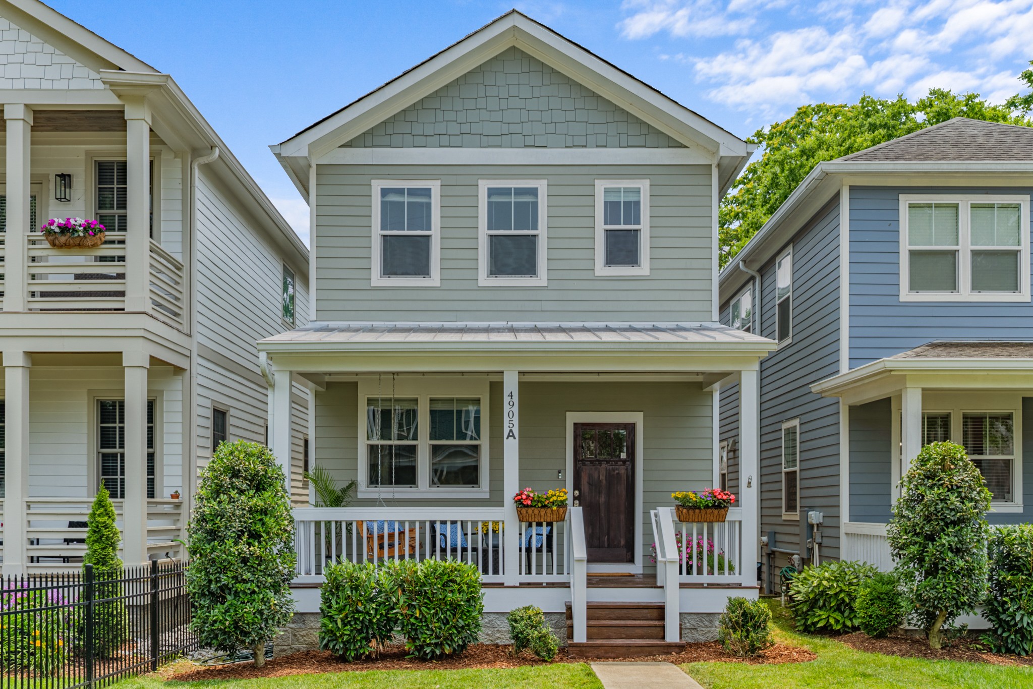 Welcome to this beautifully crafted 3-bedroom, 3-bathroom home in the heart of The Nations, one of Nashville’s most dynamic and walkable neighborhoods. This classic Craftsman-style home blends timeless charm with modern comfort—and is just steps from some of the city's best coffee shops, restaurants, and local boutiques.  Step inside to find an inviting open-concept layout featuring hardwood floors, stylish finishes, and abundant natural light. The spacious primary suite offers a true retreat with room to unwind and beautiful en-suite bath. Upstairs, a versatile bonus room provides the perfect flex space for a home office, playroom, or additional living area.  Love outdoor living? You’ll fall for the screened-in porch, ideal for morning coffee or evening relaxation year-round. A covered carport offers convenient off-street parking and additional storage.  Located in an unbeatable location with easy walkability to everything The Nations has to offer, this home perfectly balances quiet comfort with vibrant city living.  Don't miss this opportunity to own a standout home in one of Nashville’s most sought-after communities—schedule your showing today!