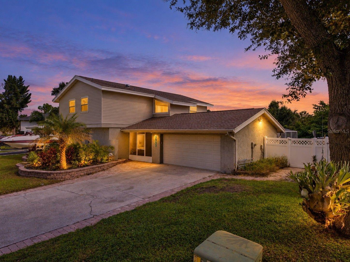 Move-in ready in Palm Harbor’s Lake St. George community! This spacious two-story, 3-bedroom, 2.5-bath home offers 2,018 sq. ft. of comfortable living space, a private screened-in pool, and a peaceful conservation backdrop with no immediate rear neighbor. The pool features a safety fence and full screened enclosure, creating an inviting space for relaxing, entertaining, and enjoying Florida living year-round.Inside, you'll find a functional floor plan with a full laundry room and a spacious kitchen offering abundant cabinet space and a built-in calendar/organization area. Major updates include an A/C replaced approximately 2 years ago, water heater approximately 4 years ago, and updated windows and doors approximately 5 years ago, valuable improvements for today's buyer.Location is a standout! Enjoy convenient access to Downtown Palm Harbor, local parks, shopping, dining, and some of Pinellas County's most popular Gulf Coast destinations, including Honeymoon Island and Caladesi Island. If you've been searching for a move-in-ready 3-bedroom pool home in Palm Harbor with over 2,000 sq. ft., updated major systems, and a conservation view, see why this home checks the boxes.