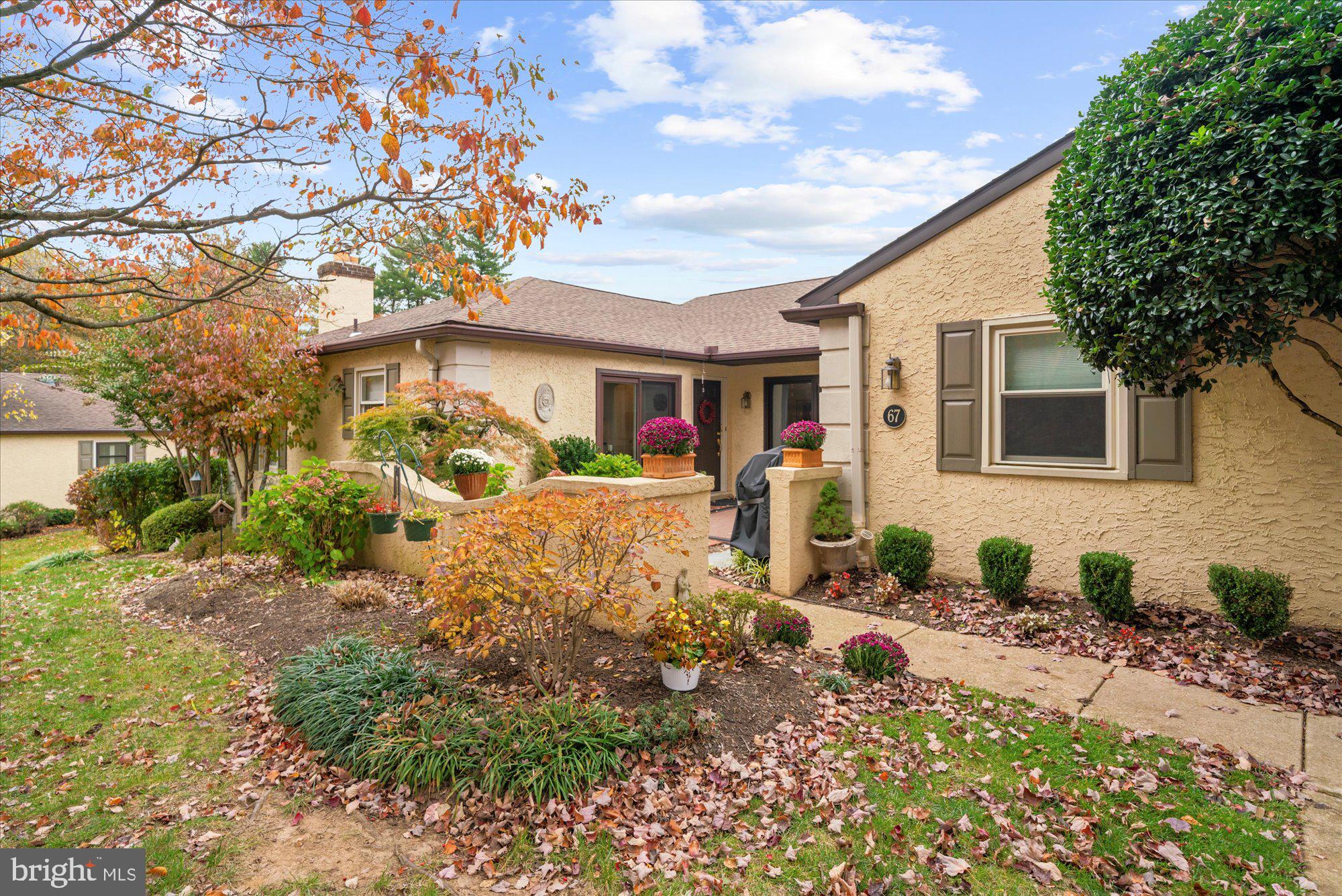 Tucked away in the secluded back corner of Millridge is this Rarely available Ranch home.Enter through your private courtyard into your wonderful home that has been nicely updated & beautifully maintained. The Kitchen features an abundance of white cabinetry, granite counter tops, stainless appliances, and a wonderful wall of windows. Off the Kitchen is a lovely Den/Family Room with a cozy gas fireplace and stack laundry in the closet. The Living/Dining Room is quite large, allowing for formal (or not) living. The back hallway provides access to the 2nd Bedroom with good closet space as well as built-in bookshelves. There is also a Hall Bath and a large storage closet. At the other end of the unit, find the generously sized Primary suite with an updated Bathroom and walk-in closet.  Downstairs, you'll find a large finished room, a second laundry room, and a huge unfinished utility/storage space. This home is just what you've been waiting for, and more! Millridge residents also enjoy use of the stunning Manor House, available for all sorts of social gatherings, large & small, including kitchen facilities. There are also guest suites available to Owners, & so much more!