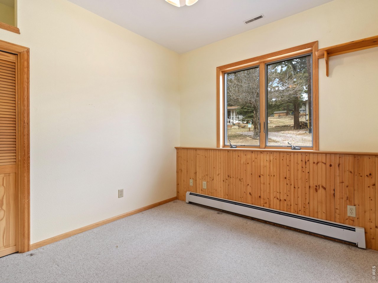 Located in the highly sought after High Drive area, just moments from the entrance to Rocky Mountain National Park, this enchanting 1925 cottage captures the very essence of Estes Park living. Set against breathtaking, unobstructed views of Longs Peak, this home offers a front row seat to Colorado's most iconic scenery. Inside, you will find 1,524 square feet of thoughtfully designed living space filled with natural light. The open floor plan creates an easy flow between the kitchen and living areas while the living room fireplace serves as a cozy focal point, perfect for snowy evenings and crisp mountain nights. Featuring three bedrooms and two bathrooms, the layout is ideal for a full time residence, a mountain getaway, or an investment retreat. Step outside to the expansive deck designed for entertaining, relaxing, or simply soaking in the panoramic mountain views that never get old. This is a rare opportunity to own a piece of Estes Park history in one of the most desirable locations, where classic charm, stunning views, and proximity to nature come together in one unforgettable home.