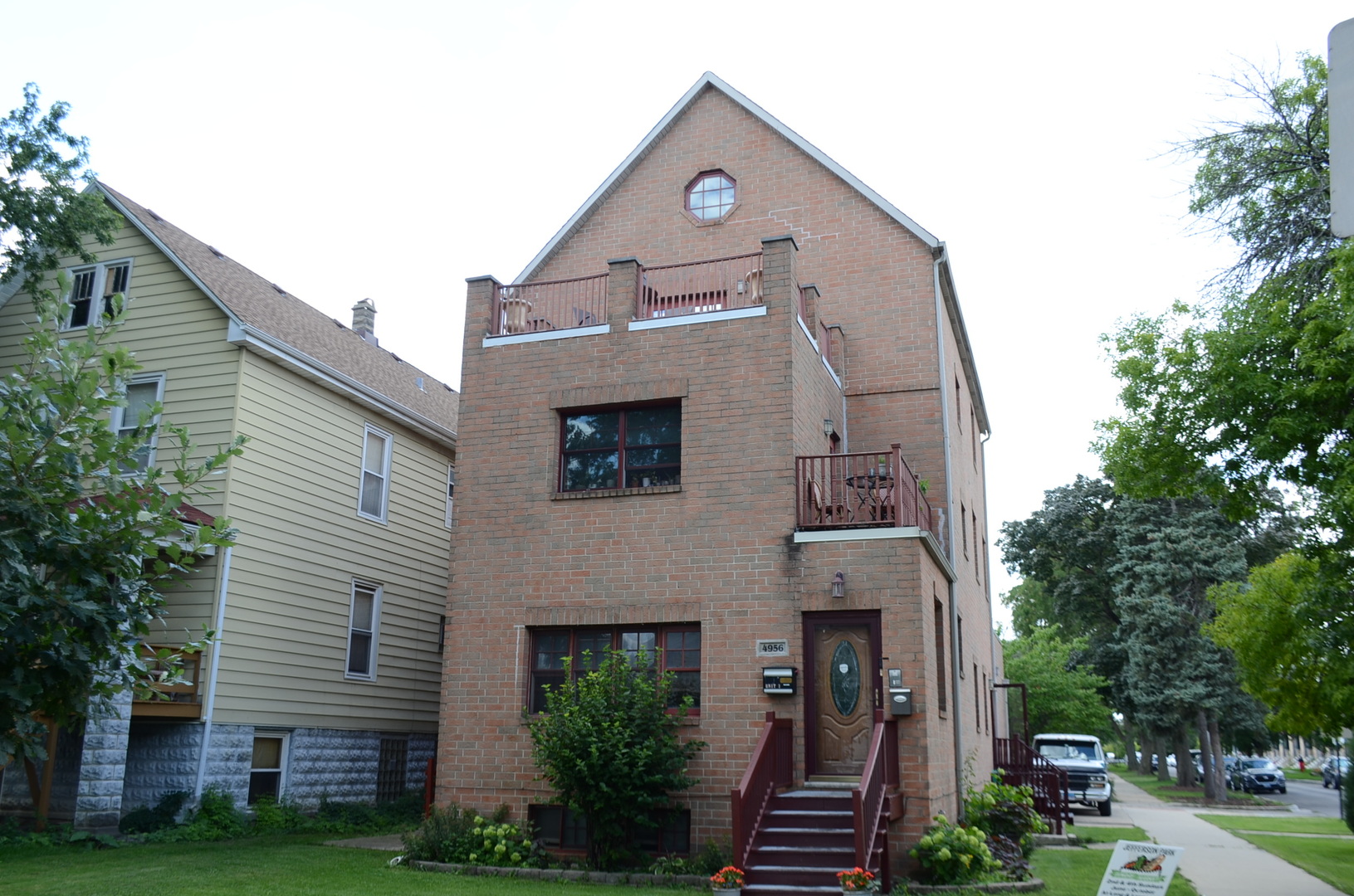 WONDERFUL JEFFERSON PARK AREA  ACROSS FROM ROBERT SQUARE PARK  A SHORT WALK TO BEAUBIEN ELEMENTARY SCHOOL AND PUBLIC TRANSPORATIONS {BUS AND TRAIN).  LOOKING FOR A SMALLER CONDO BUILDING WITH ONLY 2 OWNERS / UNITS - YOU FOUND IT IN THIS 2004 BUILT BRICK 2 UNIT BUILDING. THIS IS A VERY RARE OPPORTUNITY - 1ST FLOOR DUPLEX TO A SEPARATE  LOWER LEVEL APARTMENT WITH FRONT AND REAR DOORS (PERFECT FOR EXTRA PRIVATE SPACE FOR FAMILY OR USE IT FOR EXTRA LIVING SPACE. LOWER LEVEL HAS 4 ROOMS , 2 BEDRM , 1 BATH  & KITCHEN APARTMENT PLUS SEPARATE LAUNDRY AREA - (2 HEATING & AC  SYSTEMS & 2 WASHERS & DRYERS).  1ST FL HAS 7RMS, 2BDRMS, 1.5 BATHS AND LAUNDRY ROOM.  1ST FL CONDO HAS 2 SEPARATE GAS METERS BUT 1 ELECTRIC METER .  1 EXTERIOR PARKING BUT HAS A UNIQUE CURB CUT THAT A 2ND CAR CAN PARK ON IT. BUT THERE PLENTY OF STREET PARKING.  BOTH KITCHEN HAS OAK WOOD CABINETS AND APPLIANCES.  HIGH CEILING THROUGHOUT UPPER & LOWER LEVELS .